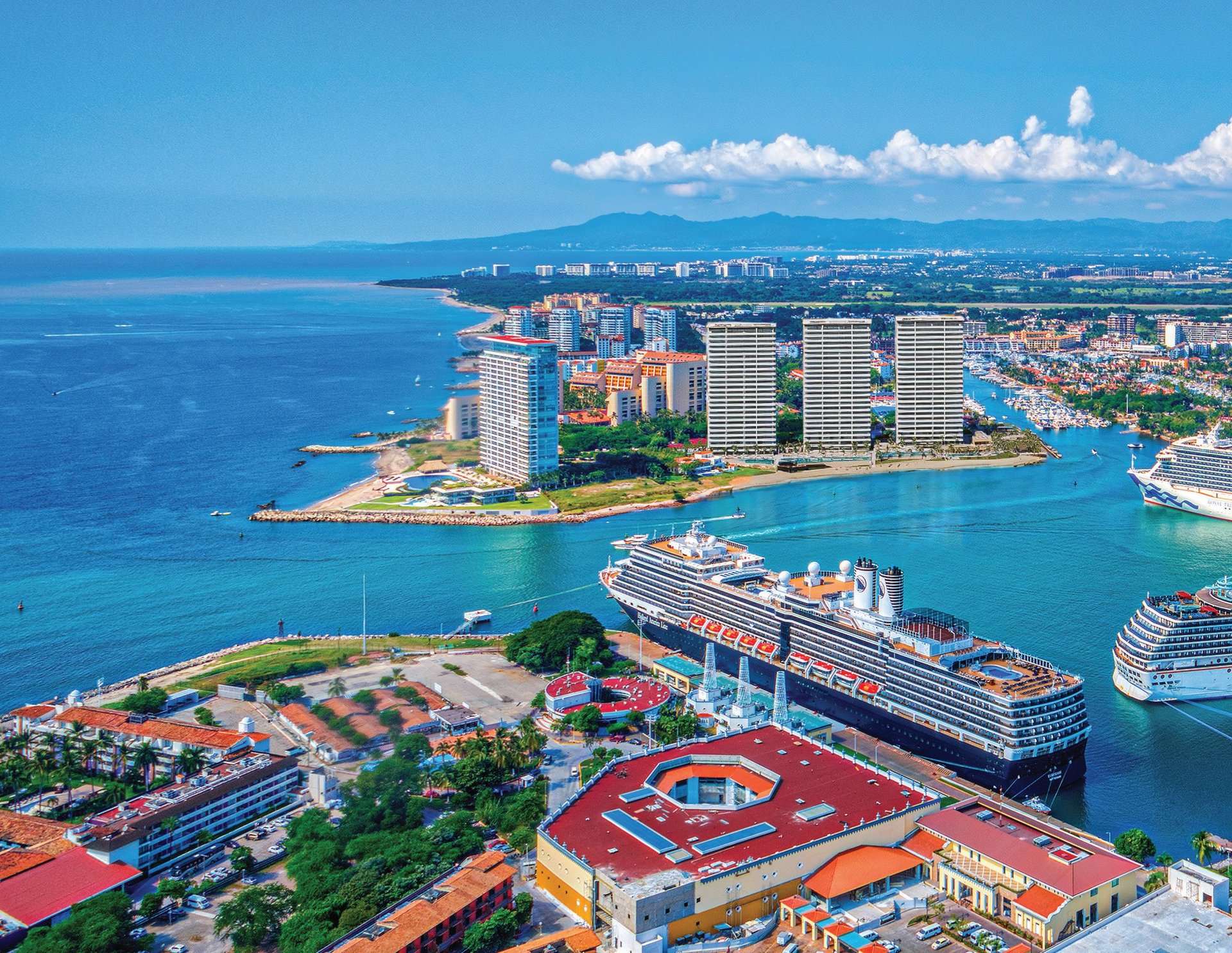an abstract photo of a curved building with a blue sky in the background