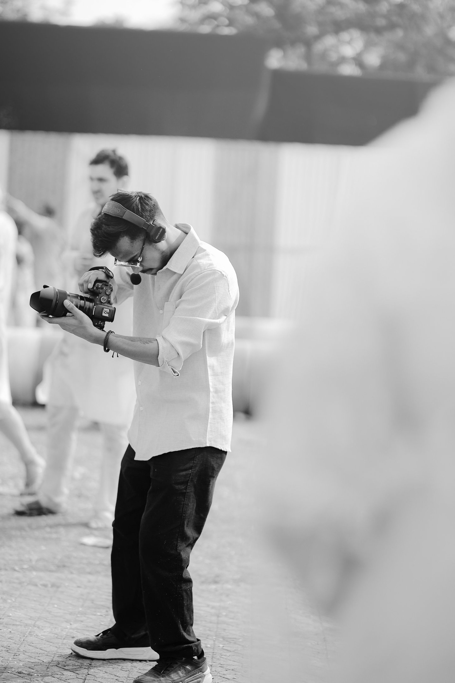 an abstract photo of a curved building with a blue sky in the background