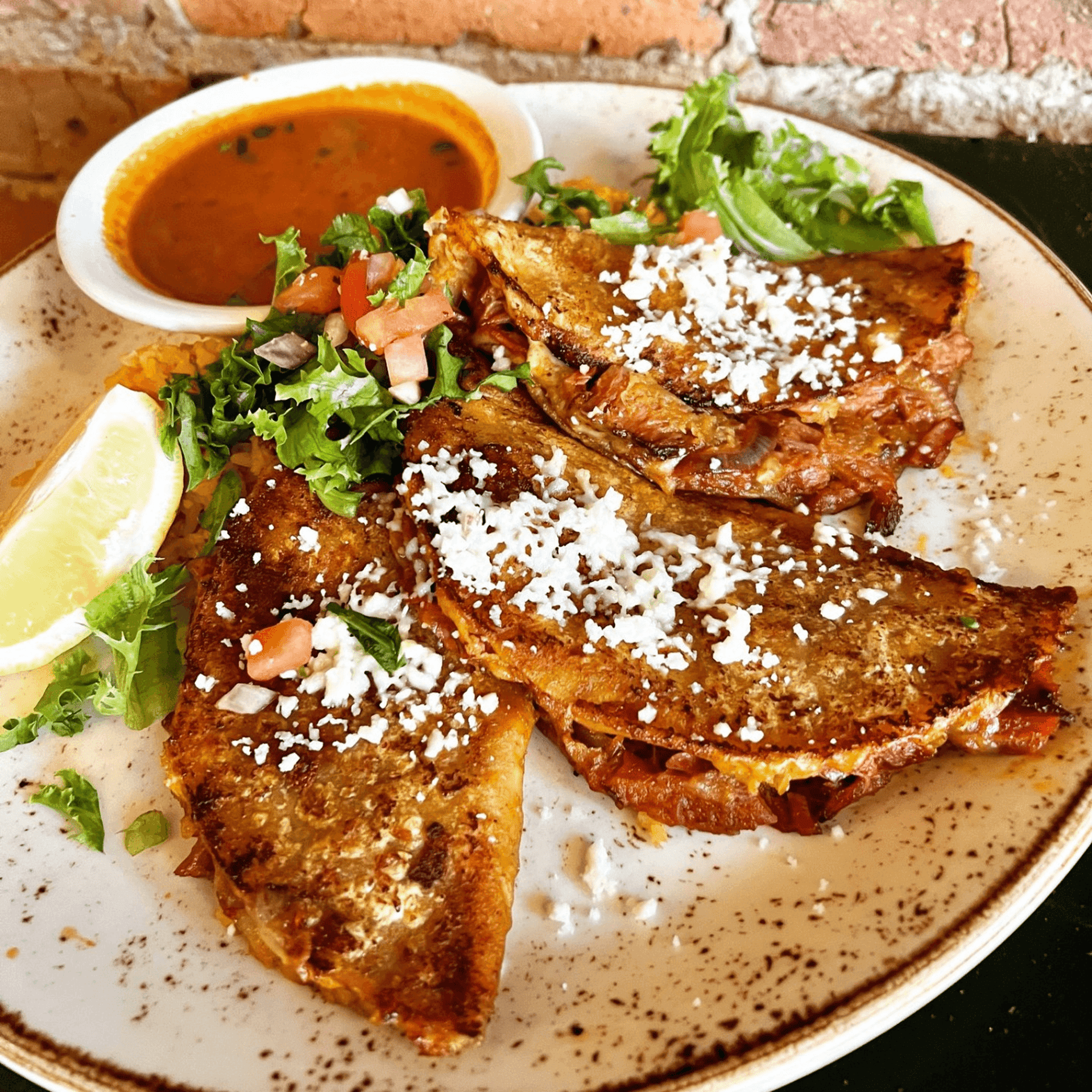 woman wearing yellow long-sleeved dress under white clouds and blue sky during daytime