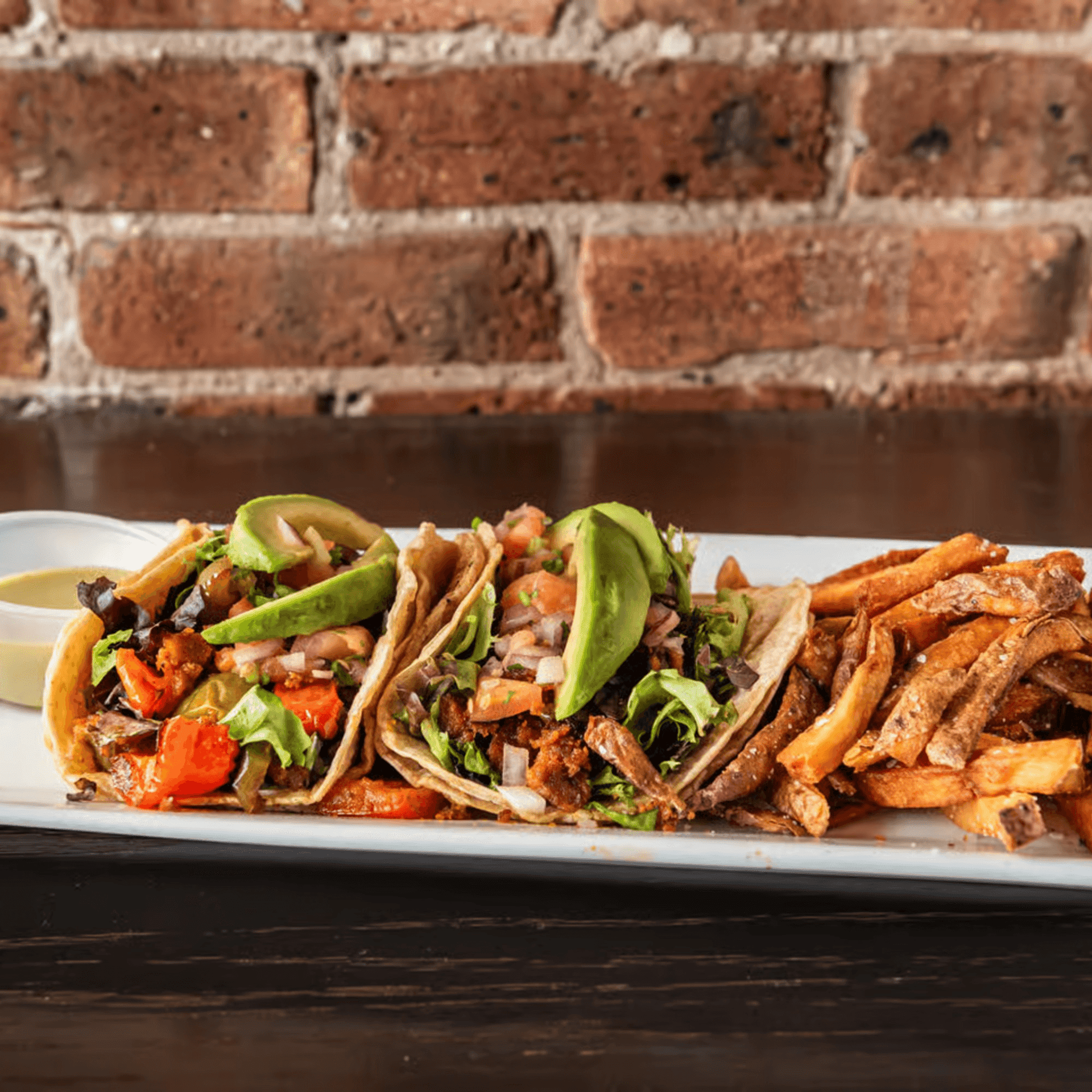 woman wearing yellow long-sleeved dress under white clouds and blue sky during daytime