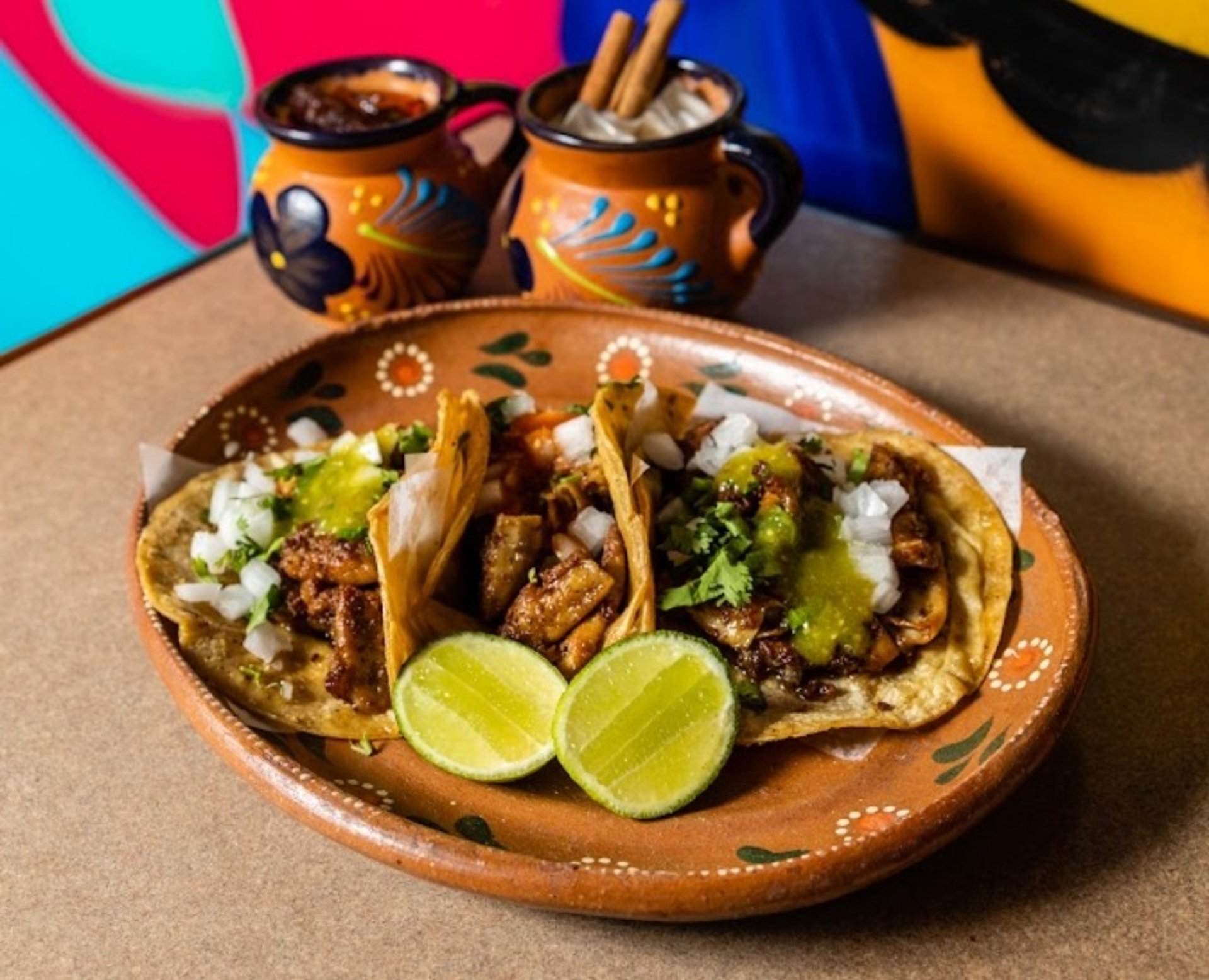 woman wearing yellow long-sleeved dress under white clouds and blue sky during daytime