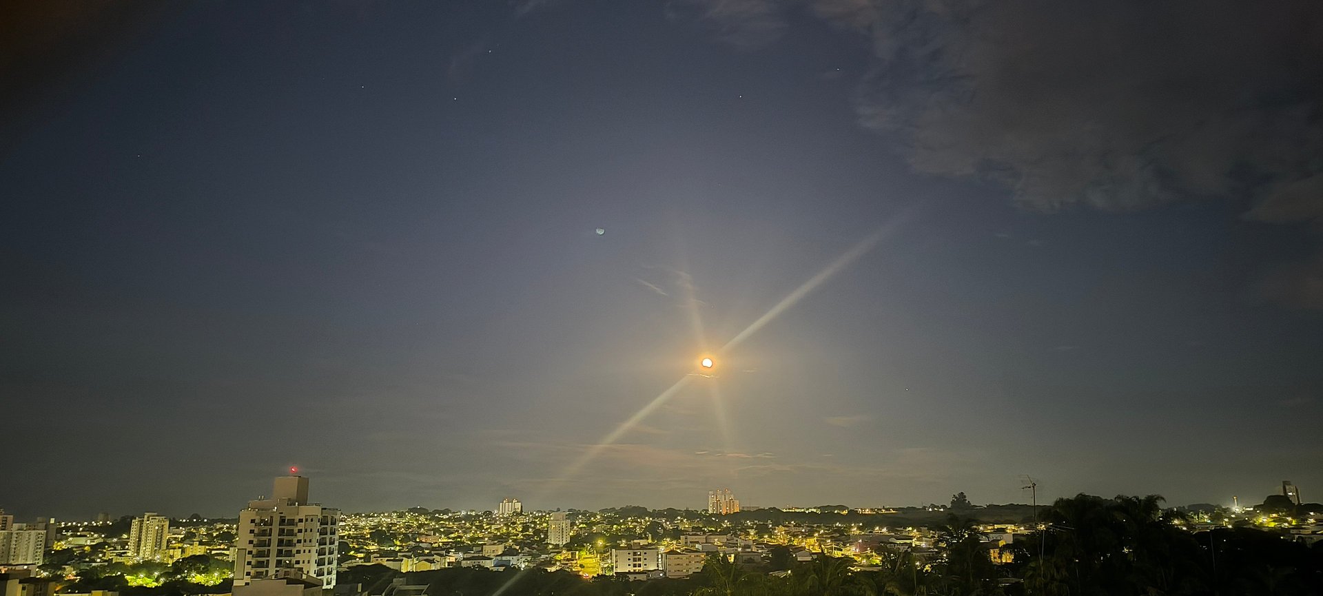 a close up of a black and brown abstract painting