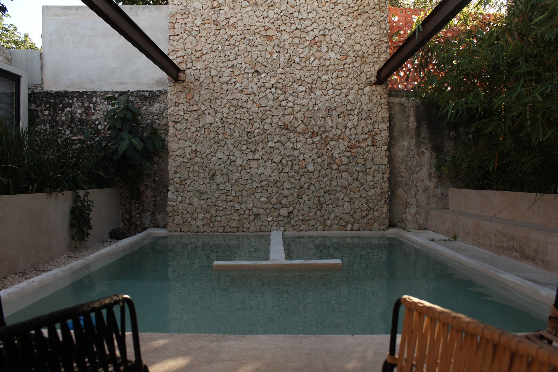 woman wearing yellow long-sleeved dress under white clouds and blue sky during daytime