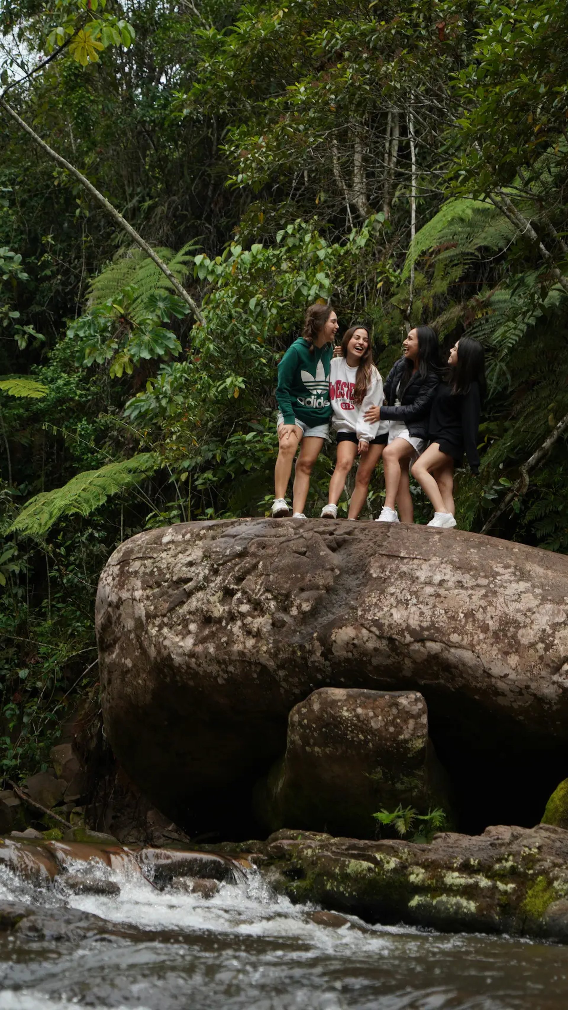 woman wearing yellow long-sleeved dress under white clouds and blue sky during daytime