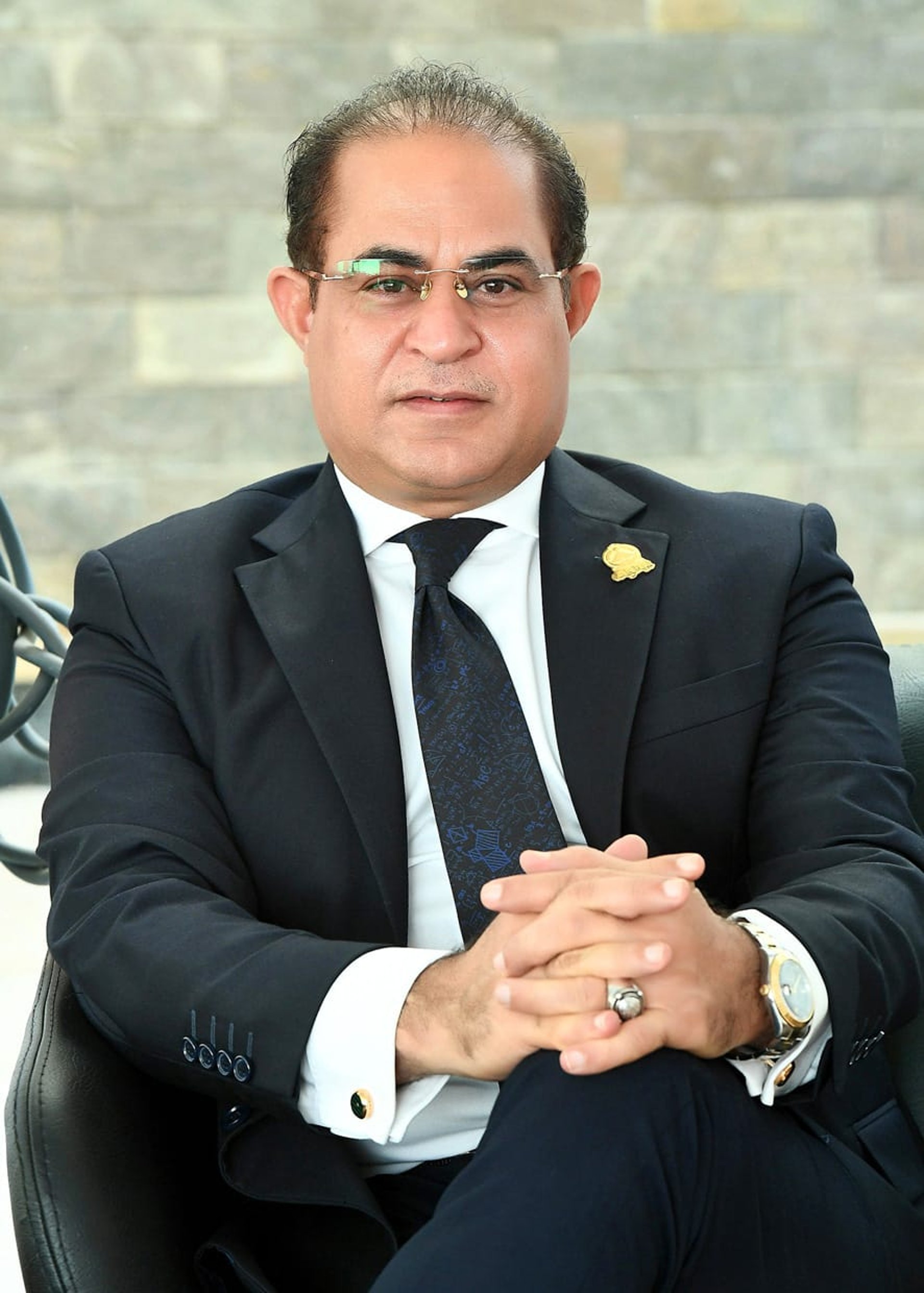 woman wearing yellow long-sleeved dress under white clouds and blue sky during daytime