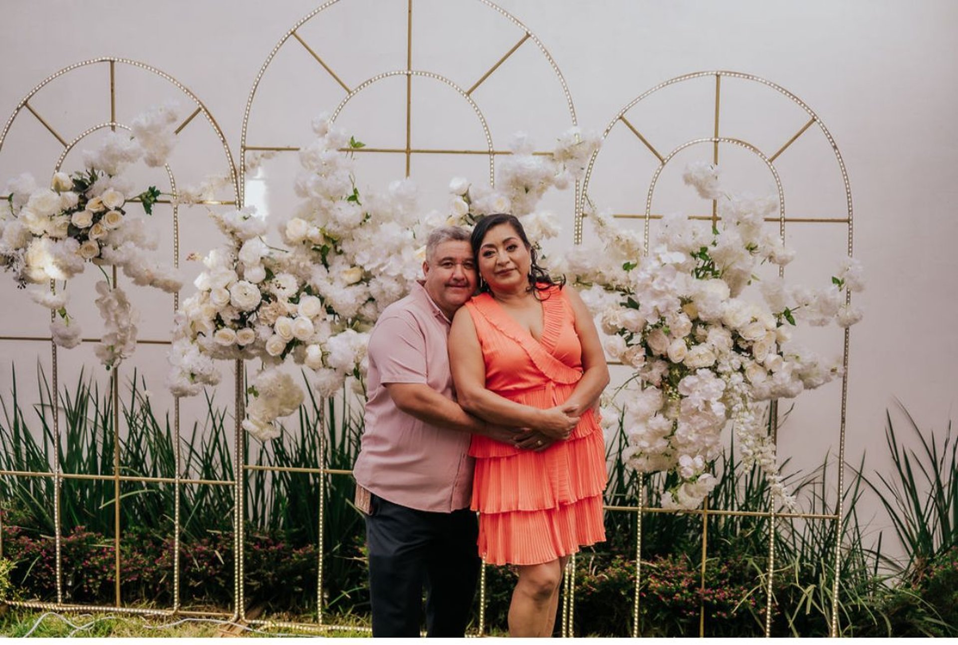 couple wearing silver-colored rings
