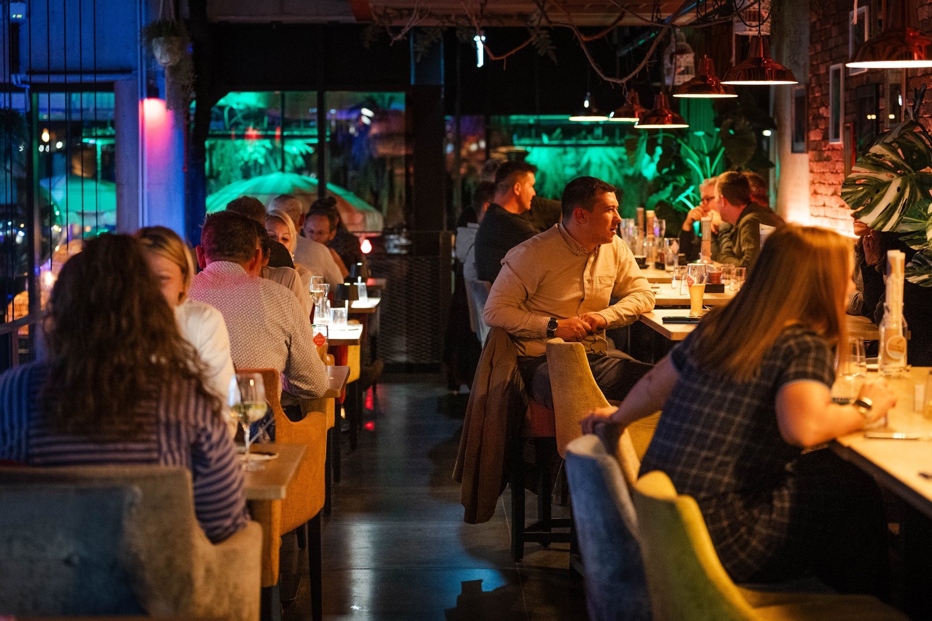 black and brown leather padded tub sofa