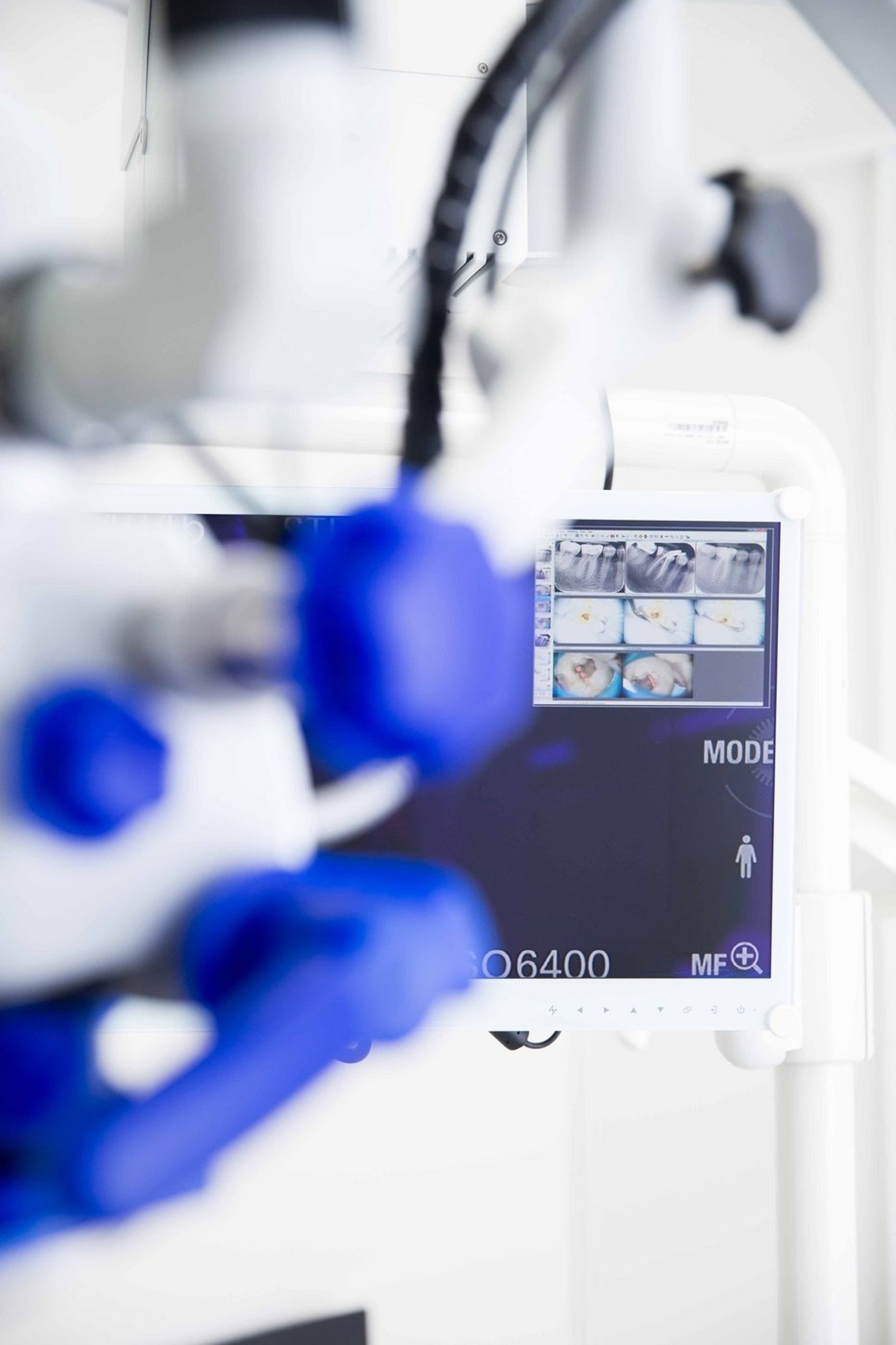woman wearing yellow long-sleeved dress under white clouds and blue sky during daytime