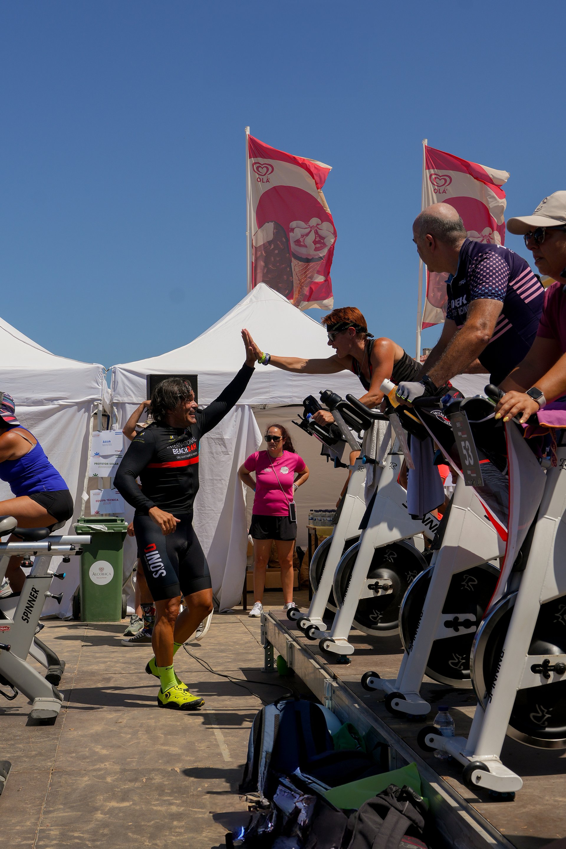 an abstract photo of a curved building with a blue sky in the background