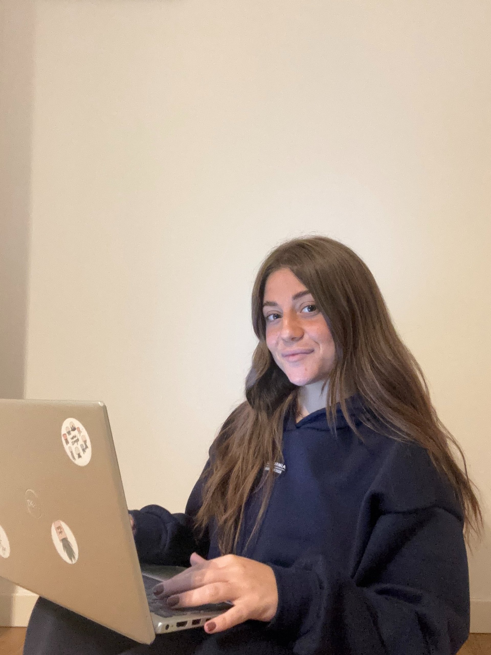 macbook pro on brown wooden table