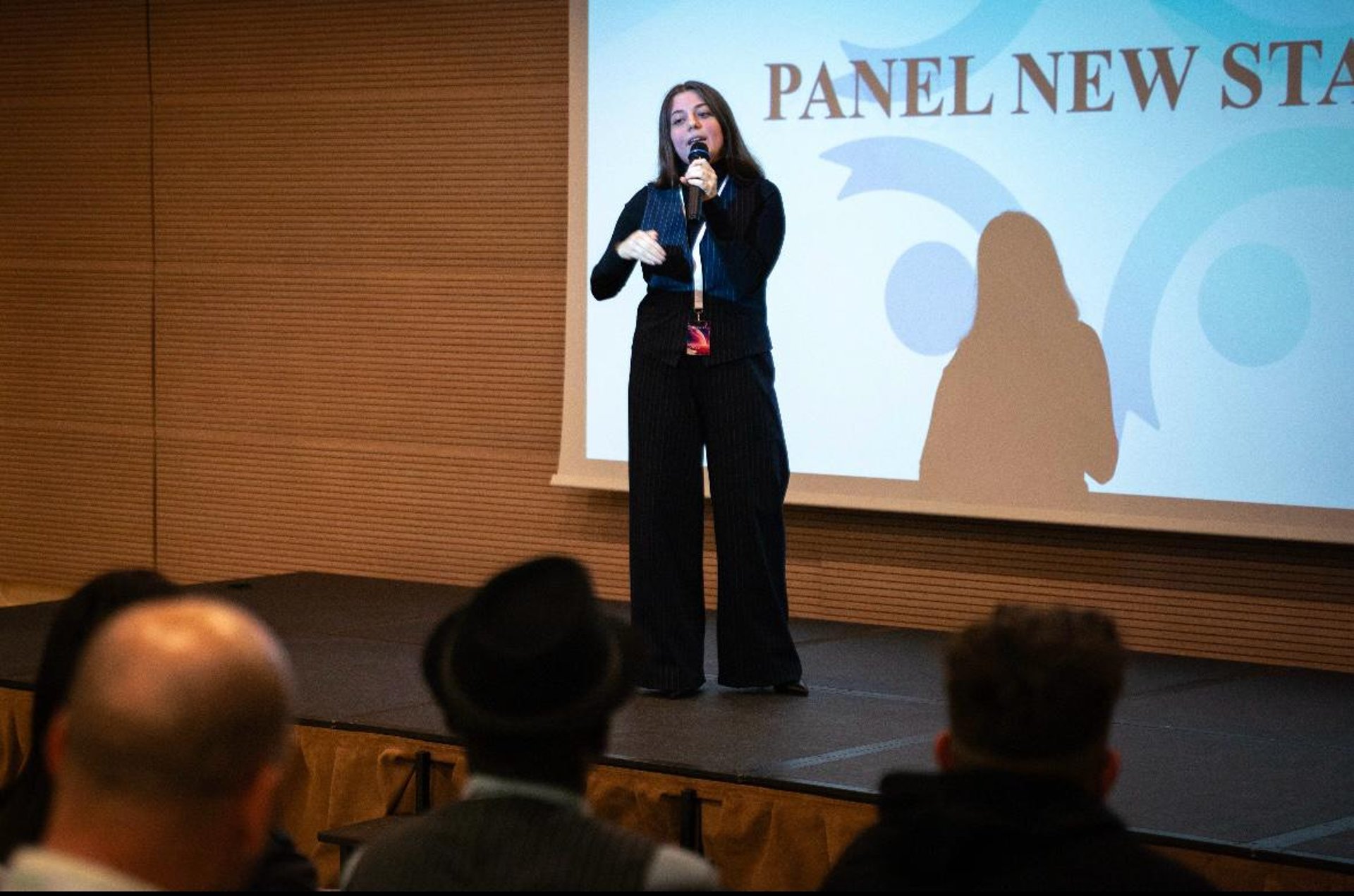 woman wearing yellow long-sleeved dress under white clouds and blue sky during daytime