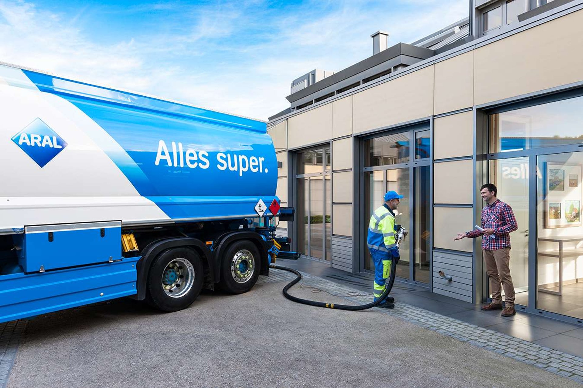 man wearing black jacket holding rod