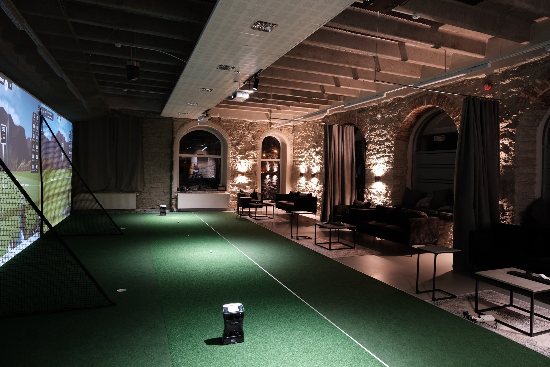 photo of man swinging golf driver