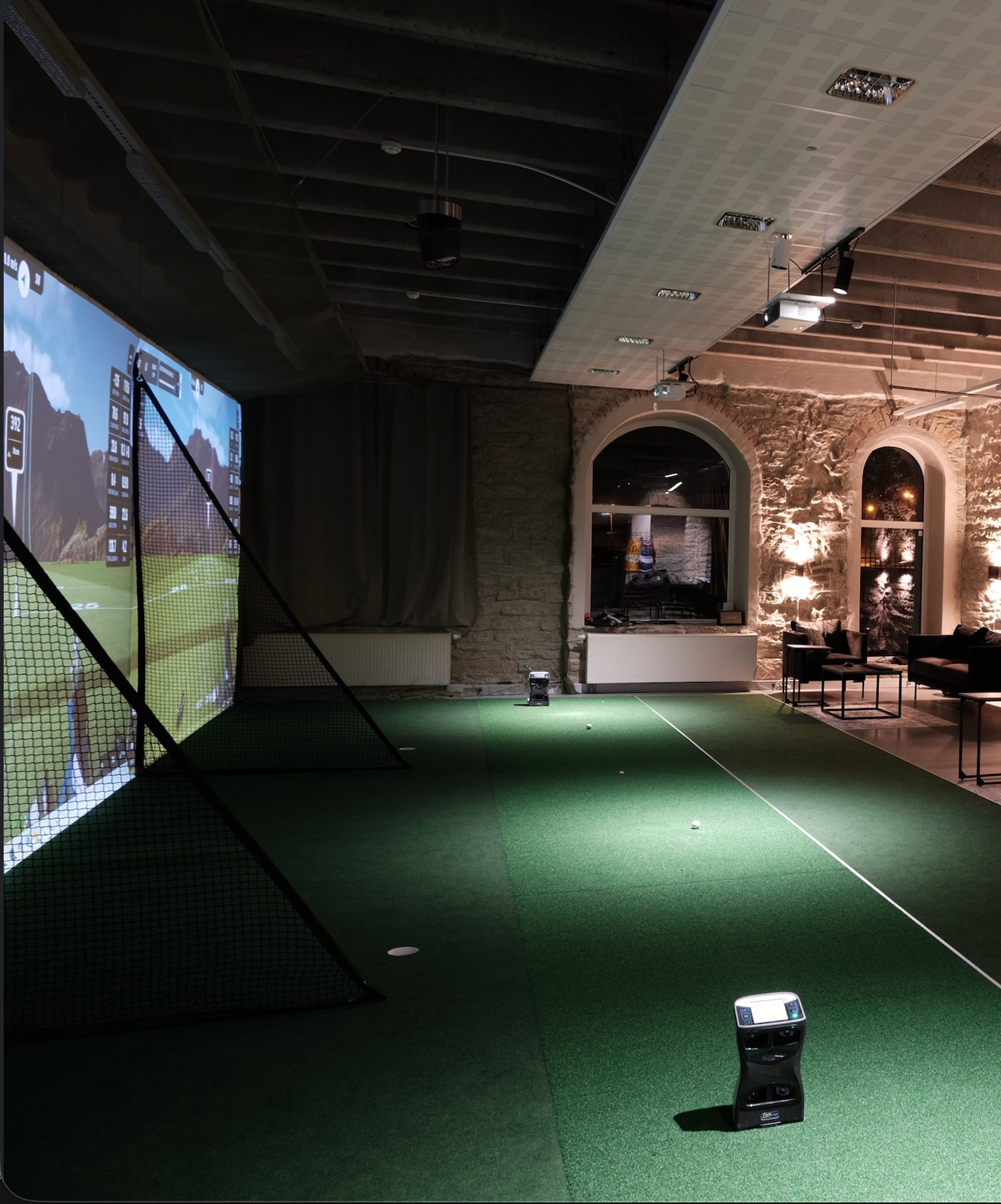 photo of man swinging golf driver