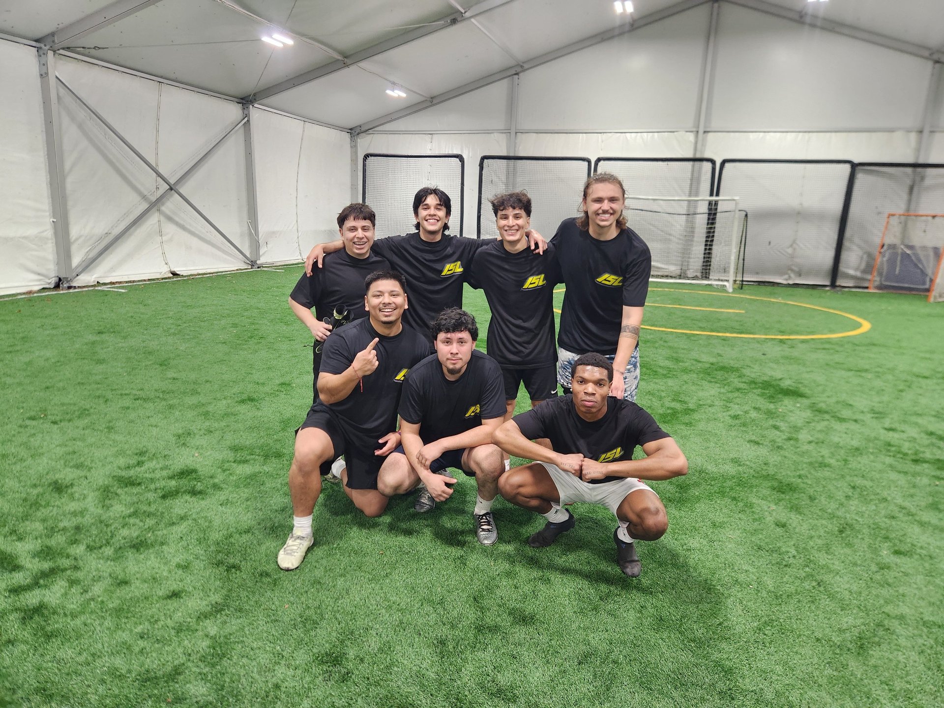 an abstract photo of a curved building with a blue sky in the background