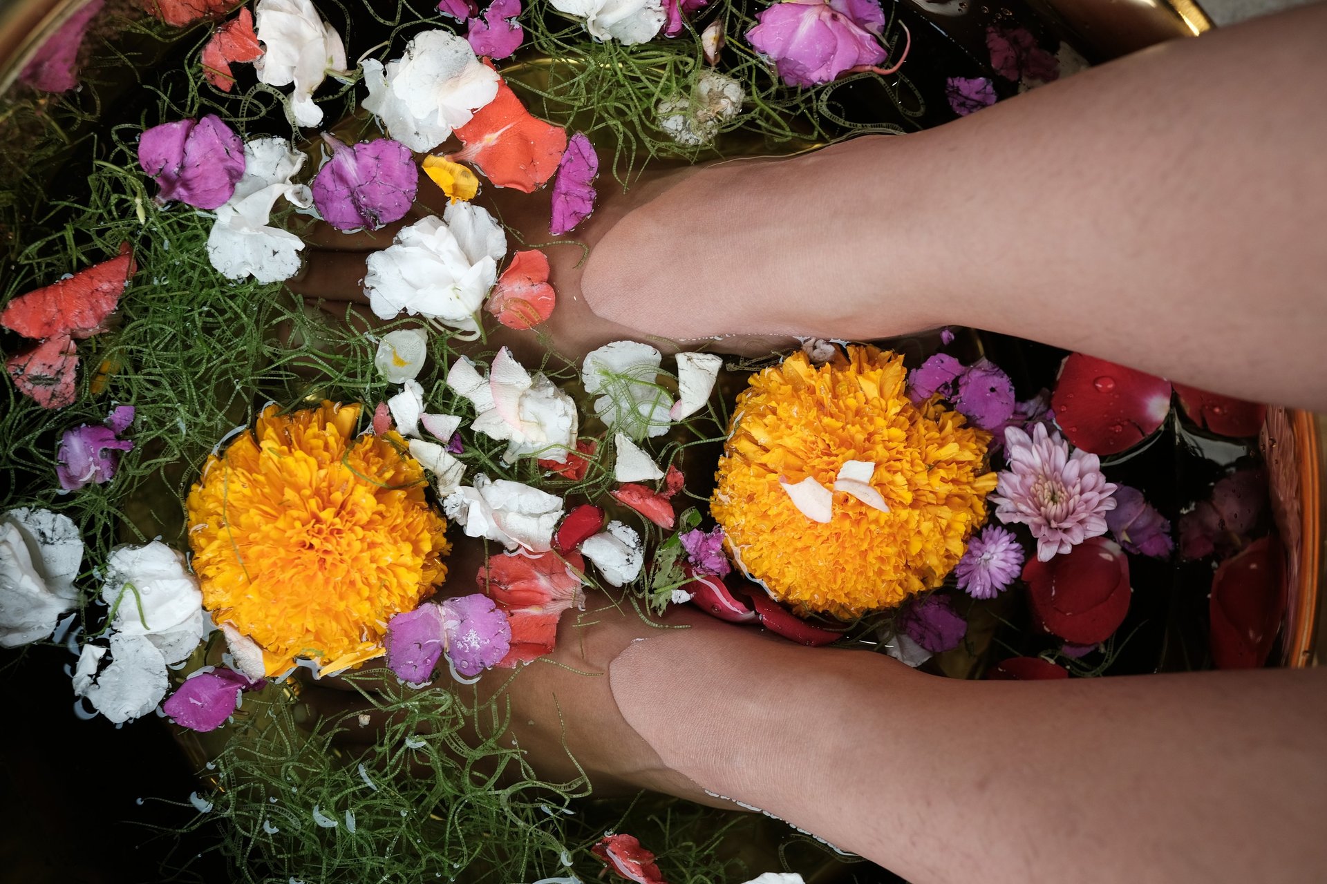 an abstract photo of a curved building with a blue sky in the background