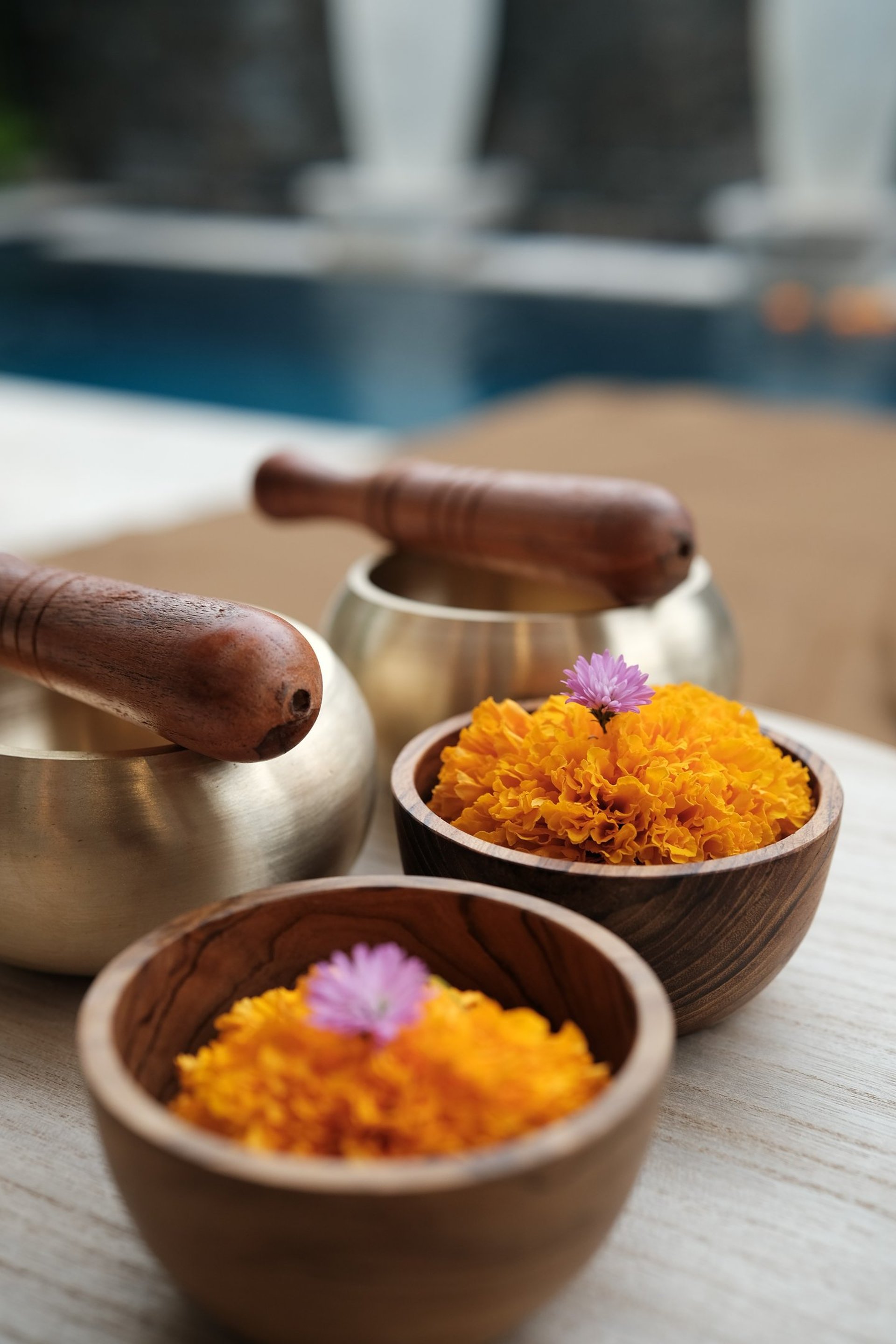 an abstract photo of a curved building with a blue sky in the background