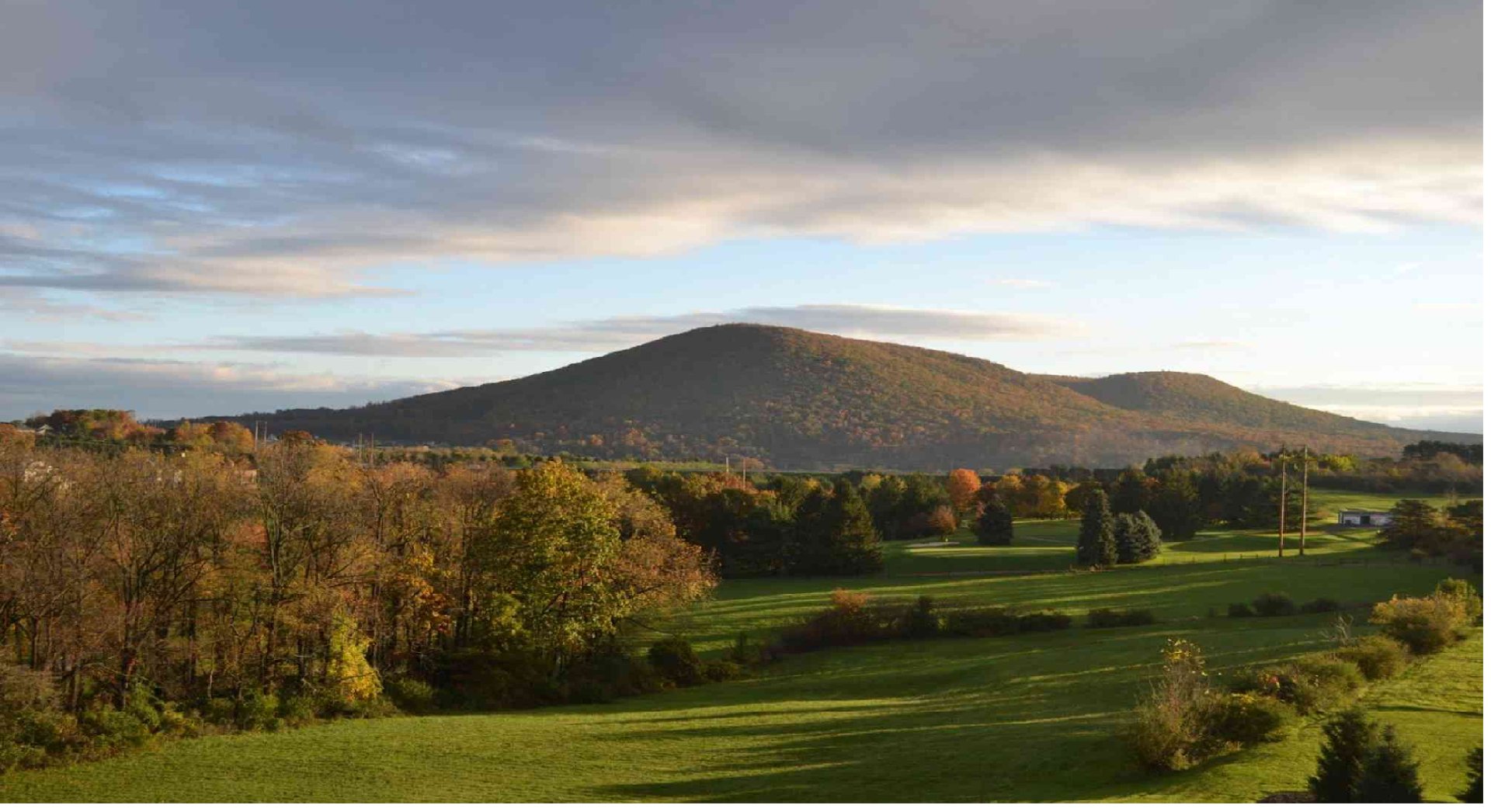 mountain range under blue sky
