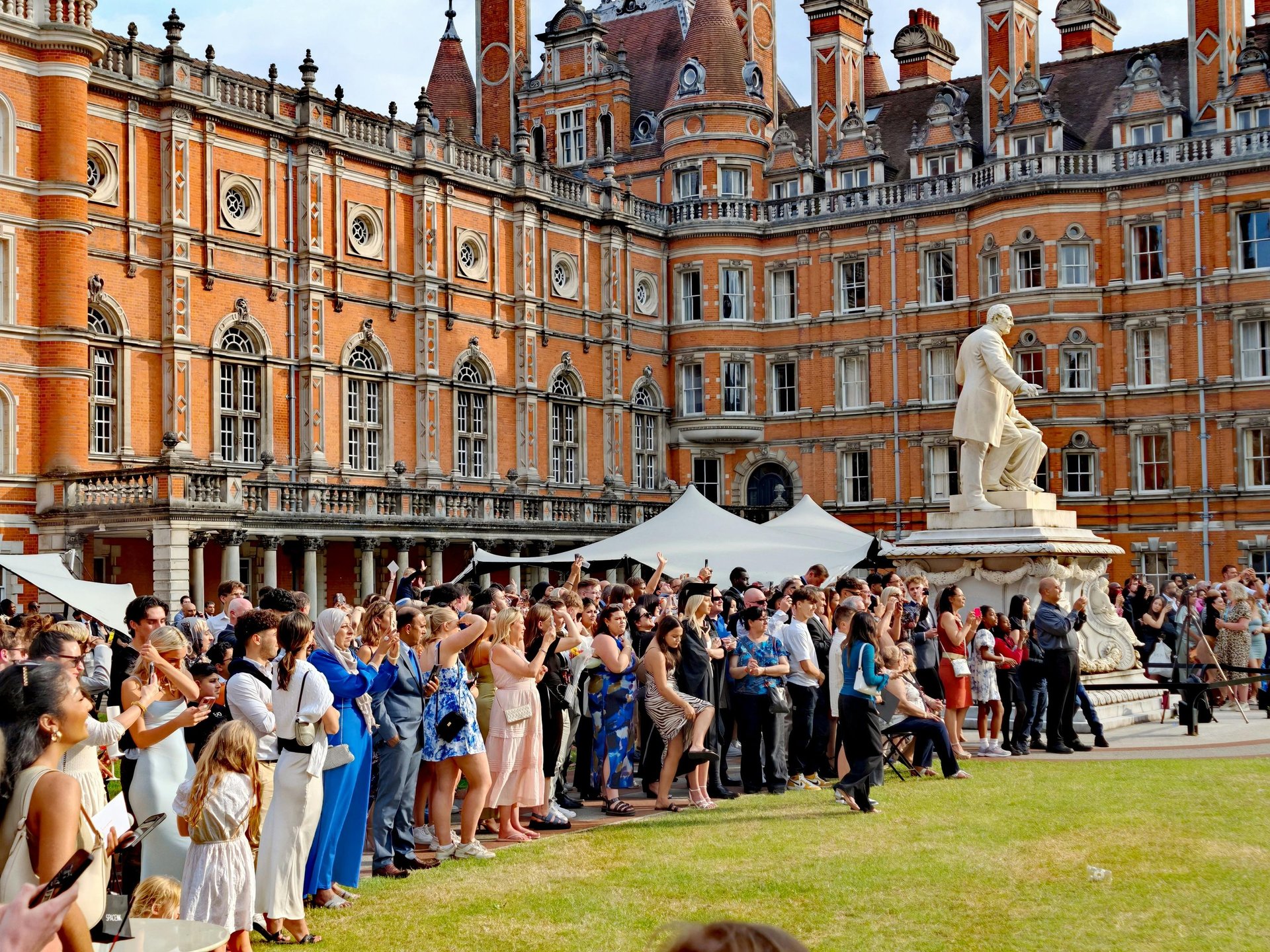 woman wearing yellow long-sleeved dress under white clouds and blue sky during daytime