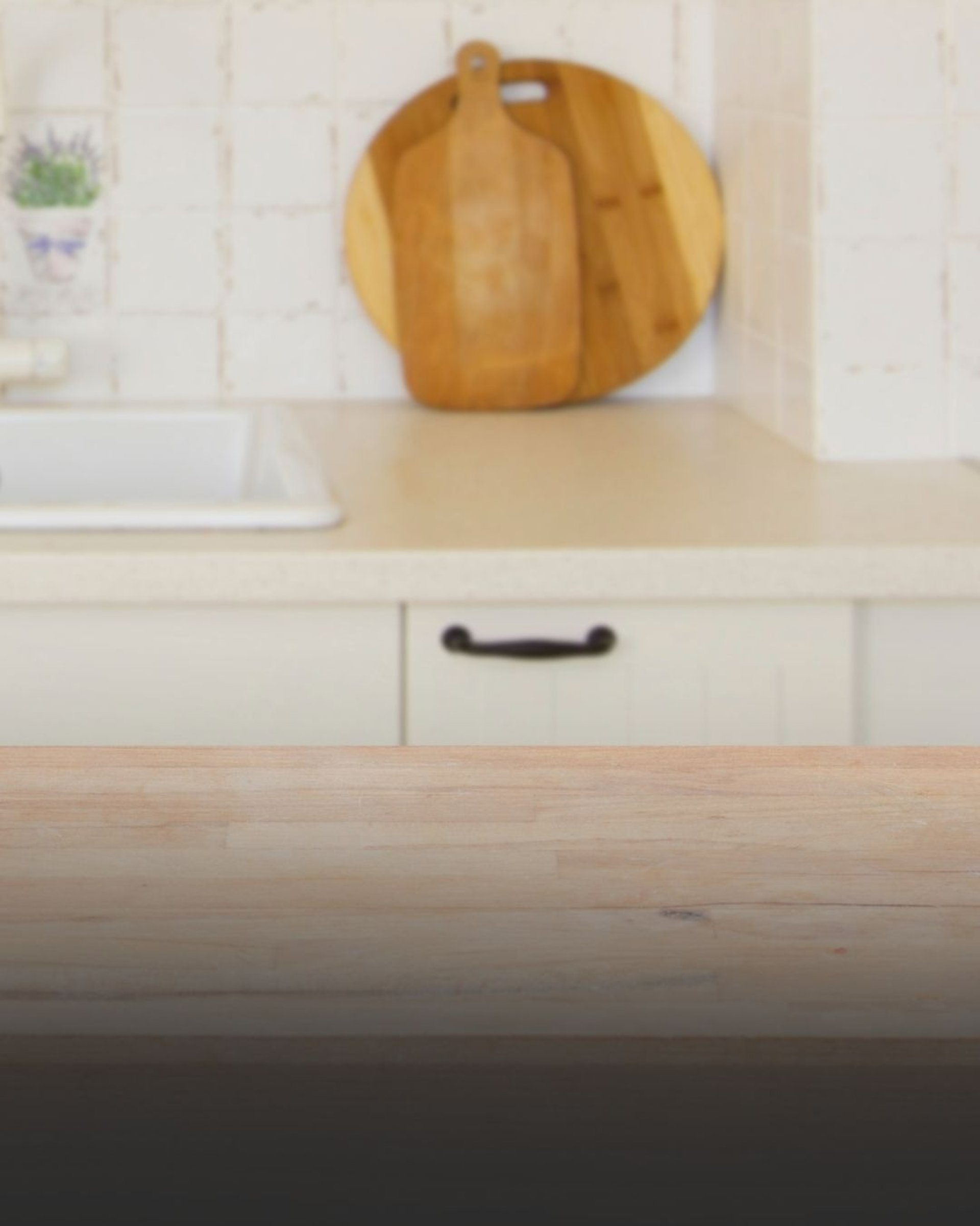 an abstract photo of a curved building with a blue sky in the background
