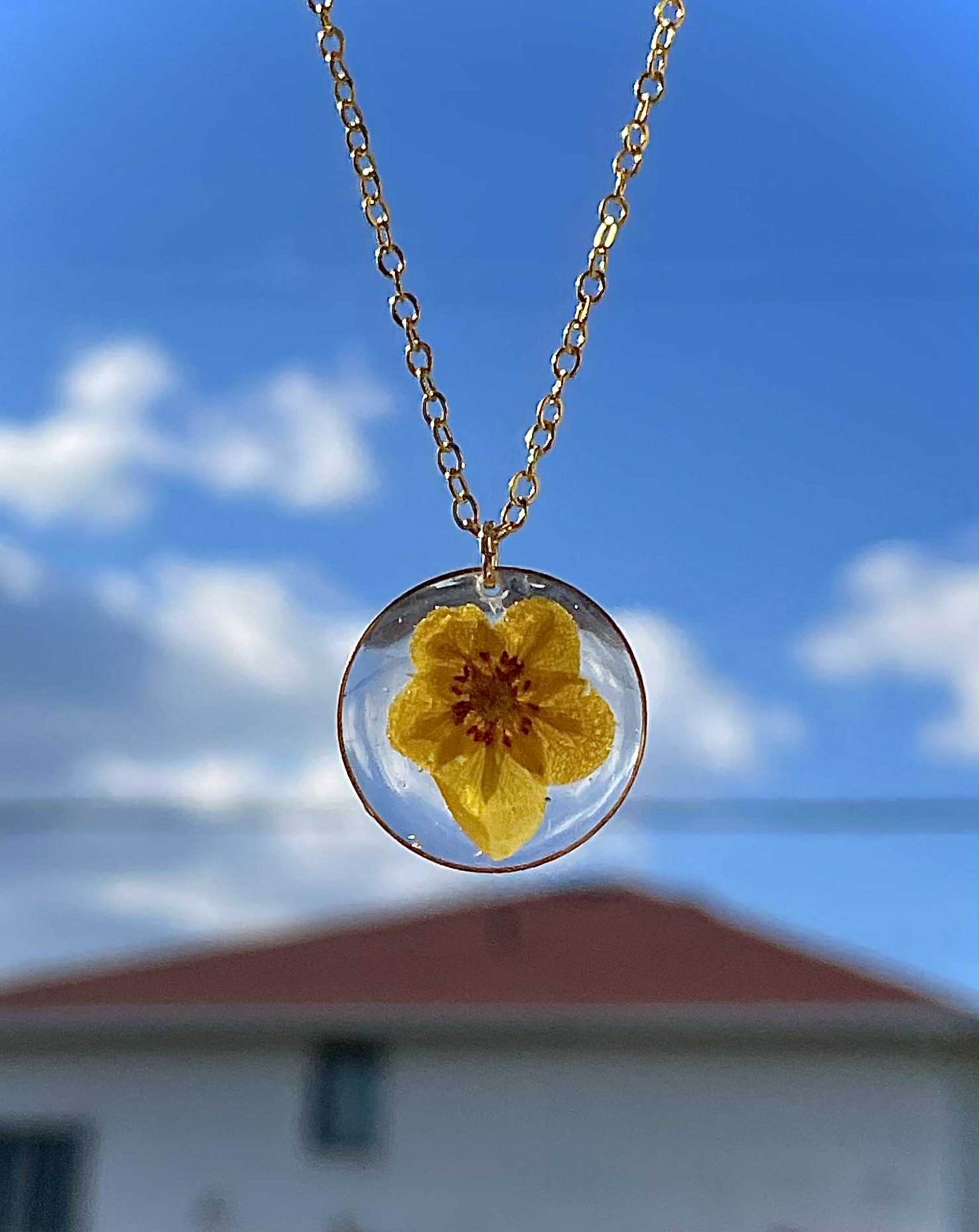 gold and green gemstone ring