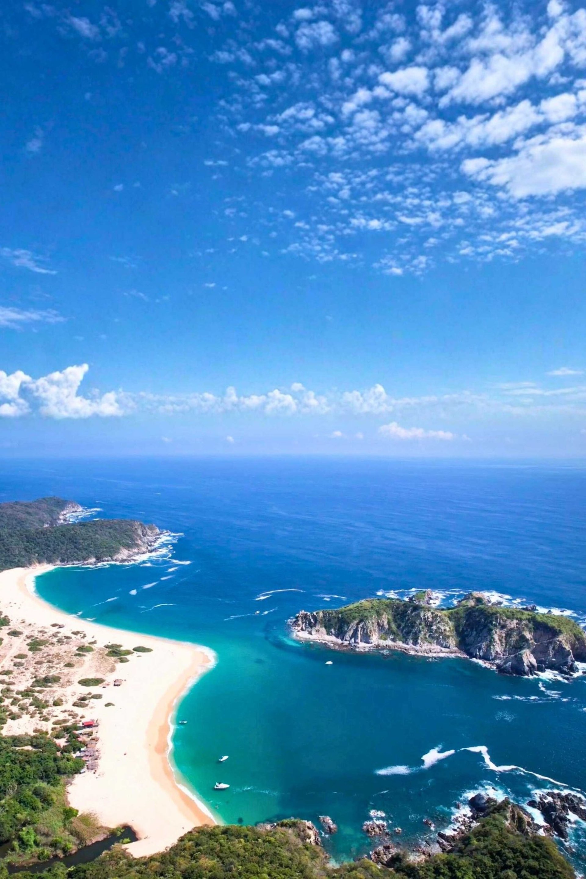 an abstract photo of a curved building with a blue sky in the background