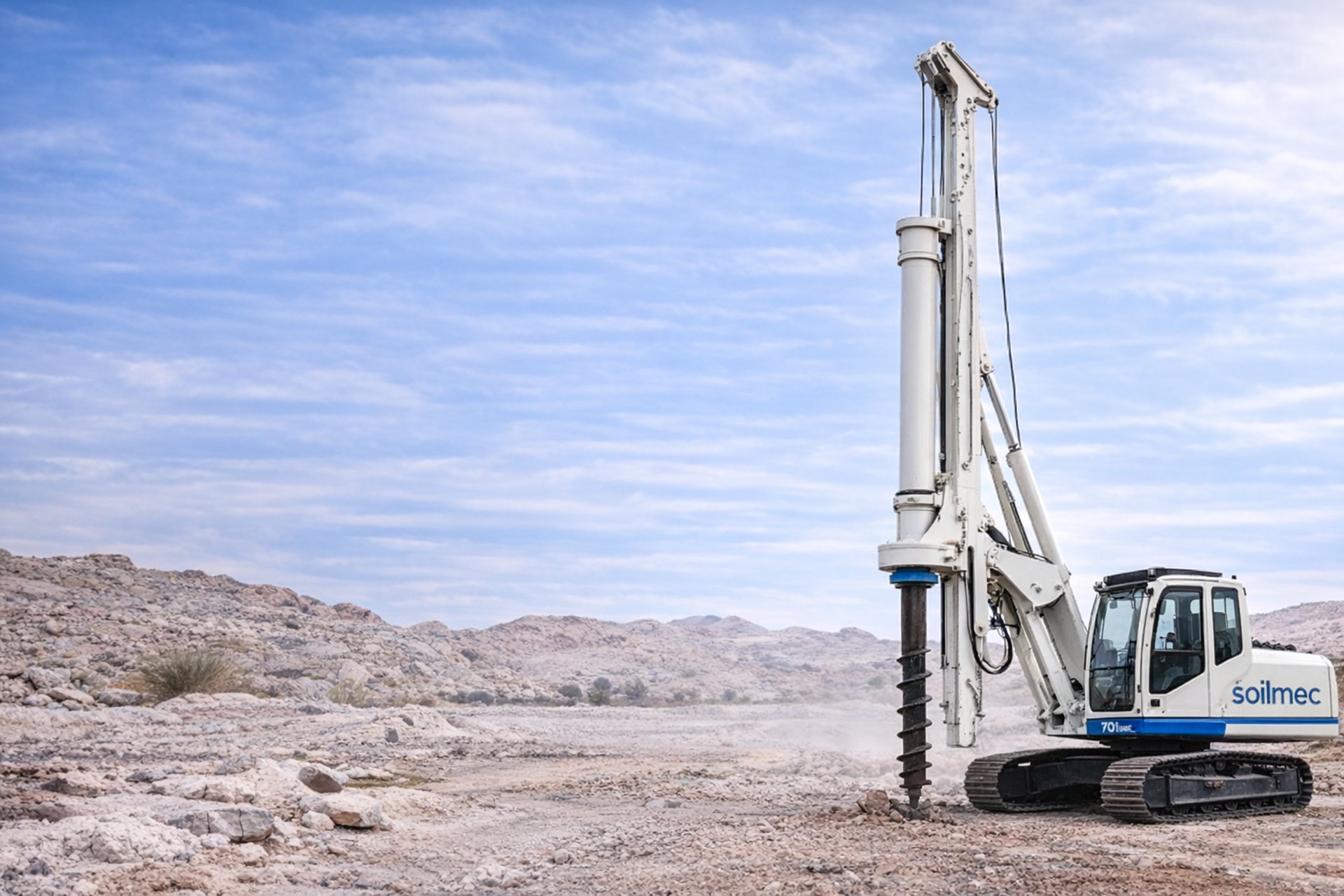 an abstract photo of a curved building with a blue sky in the background
