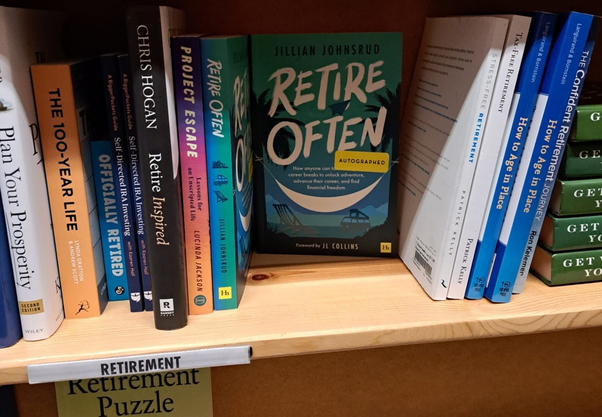 books on brown wooden shelf