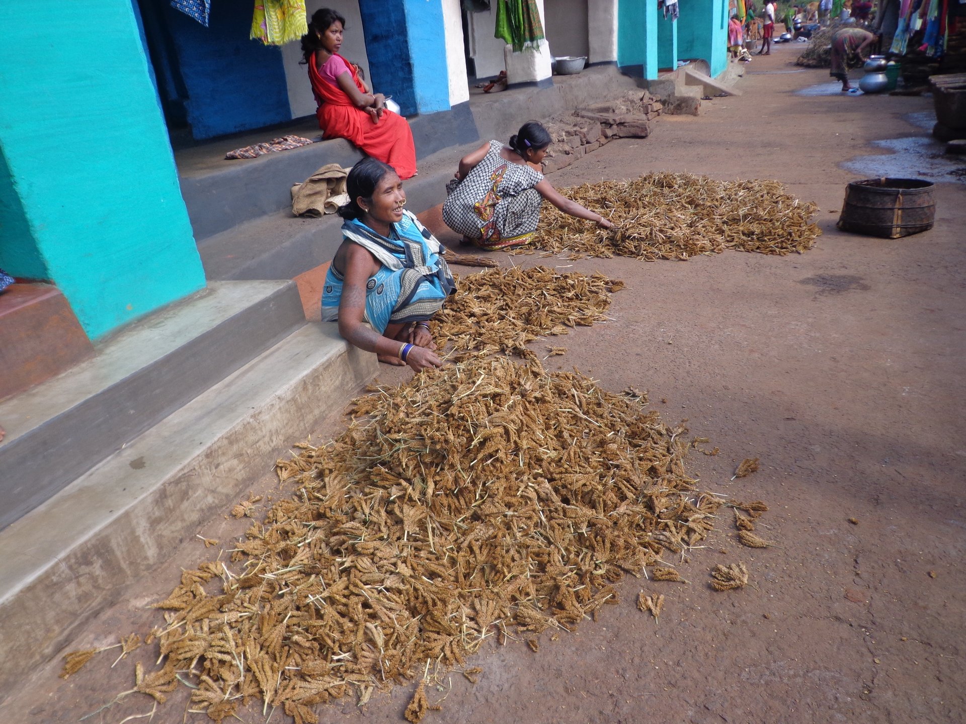 woman wearing yellow long-sleeved dress under white clouds and blue sky during daytime