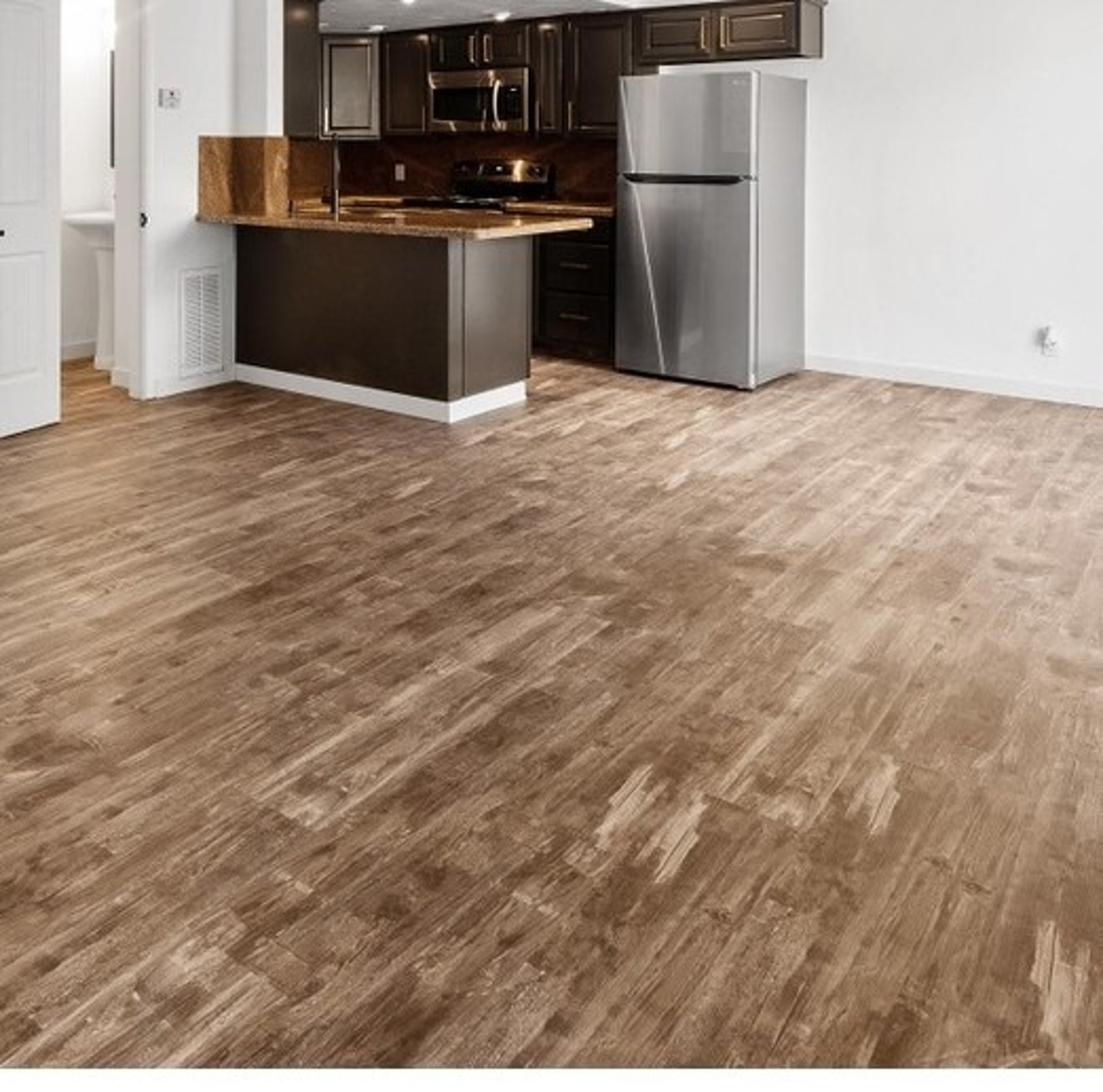 black and brown leather padded tub sofa