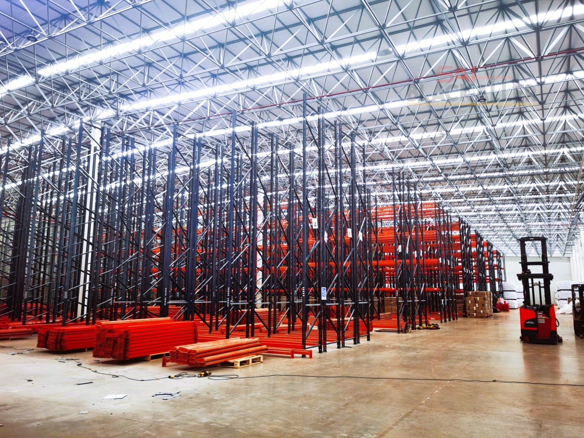 man in blue jacket wearing blue mask