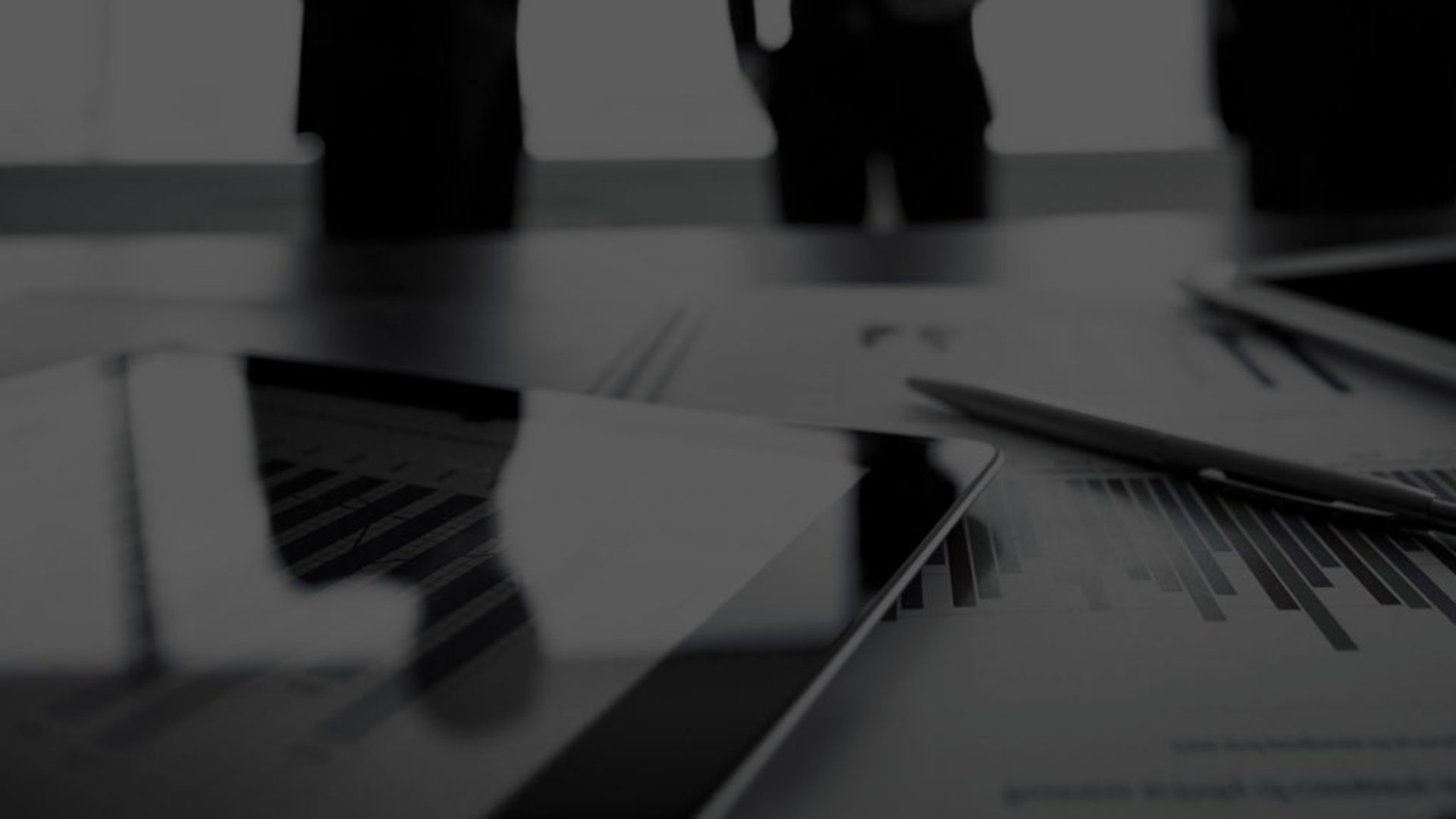 an abstract photo of a curved building with a blue sky in the background