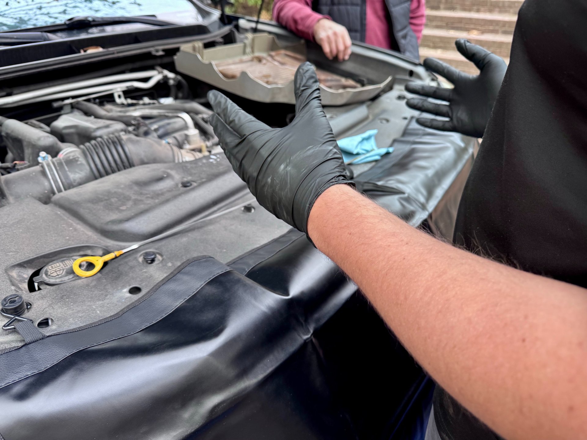 black and brown leather padded tub sofa