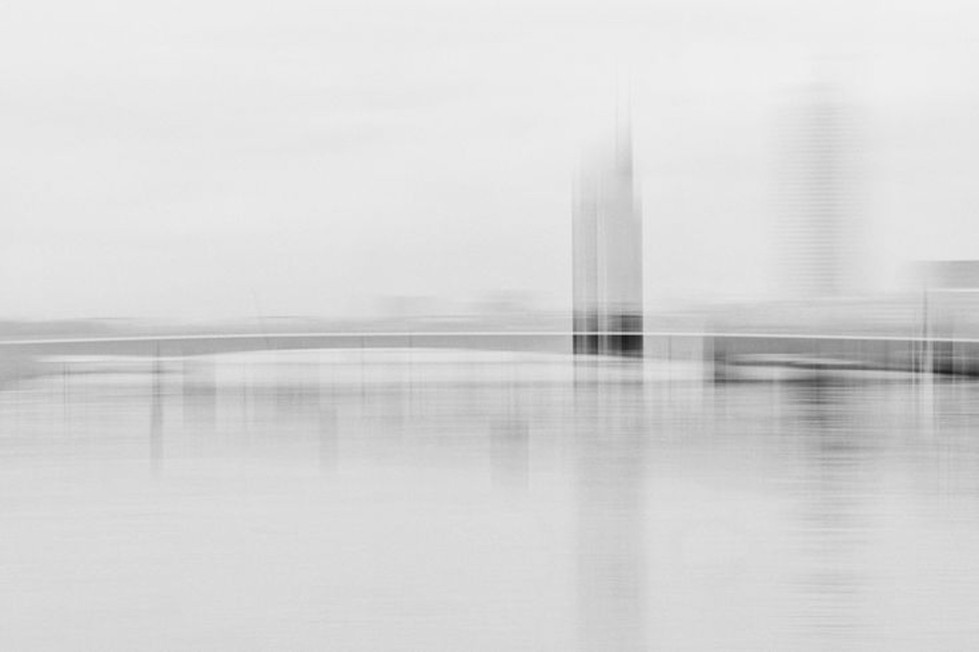 empty hallway between concrete buildings during daytime