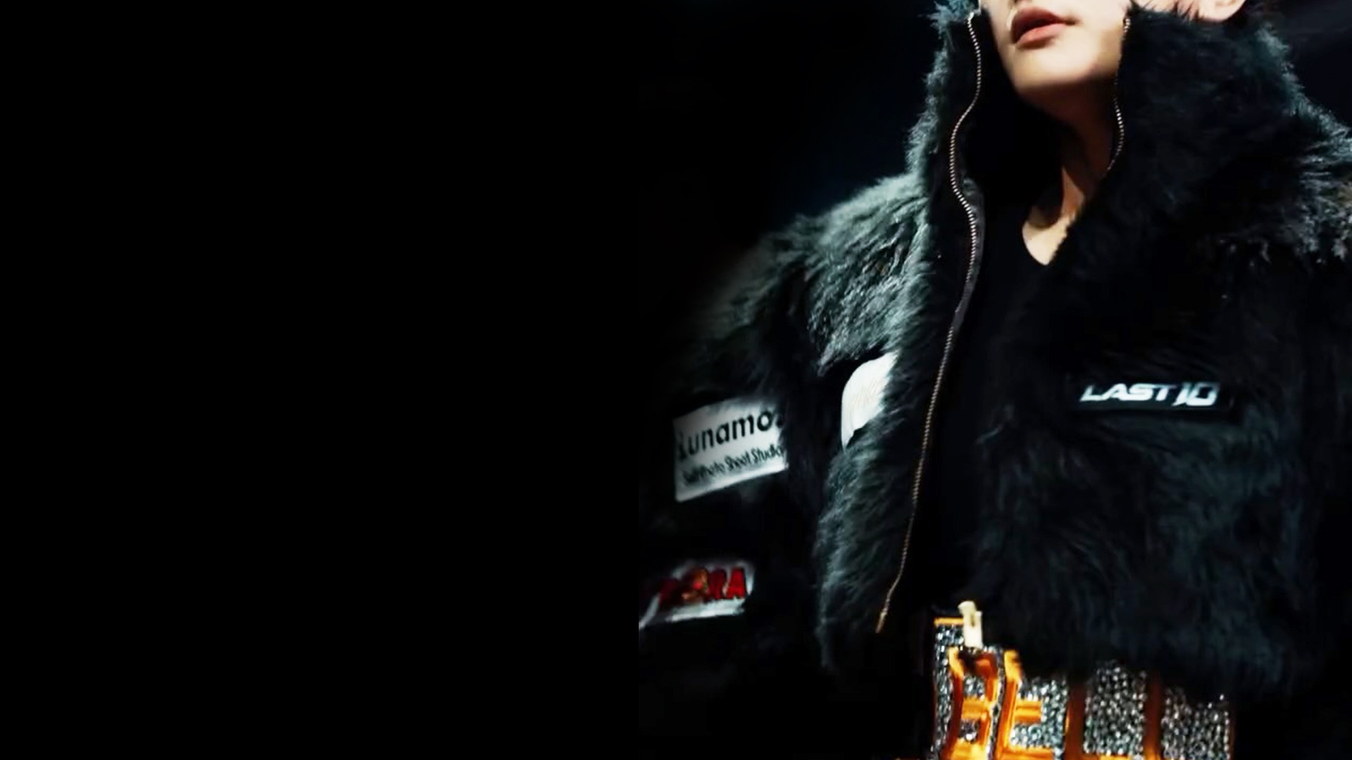 a close up of a black and brown abstract painting