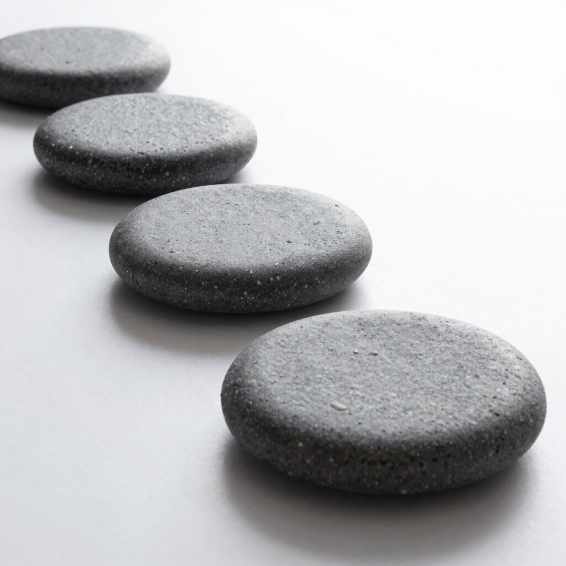 an abstract photo of a curved building with a blue sky in the background