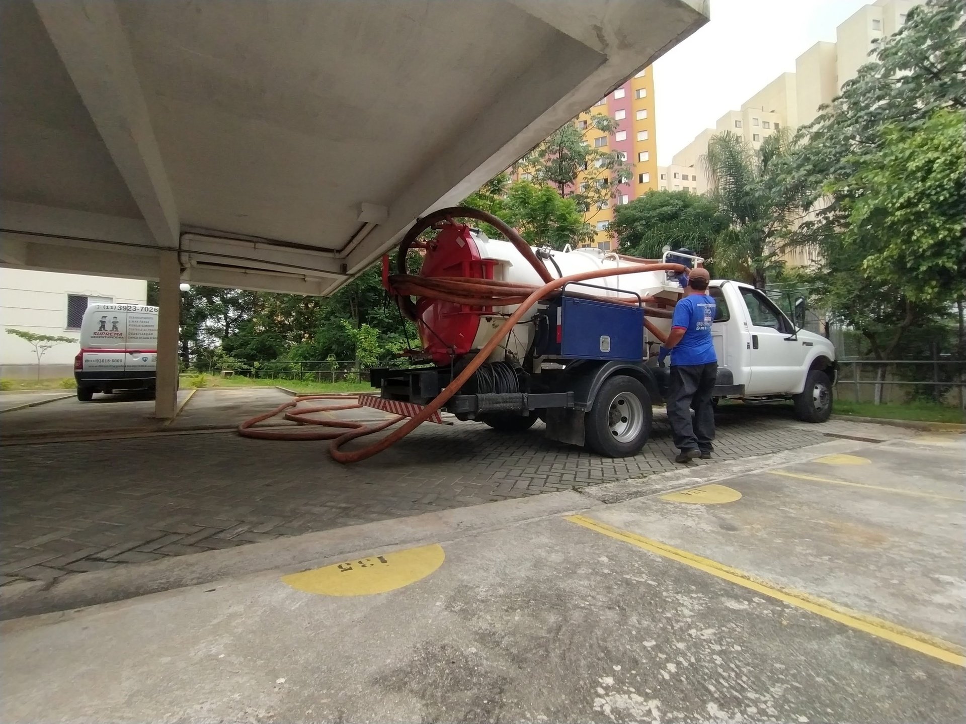 an abstract photo of a curved building with a blue sky in the background