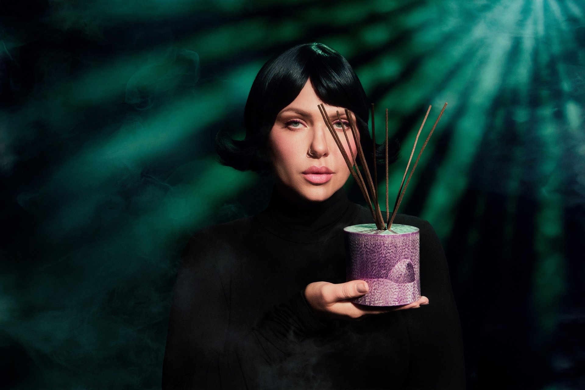 an abstract photo of a curved building with a blue sky in the background