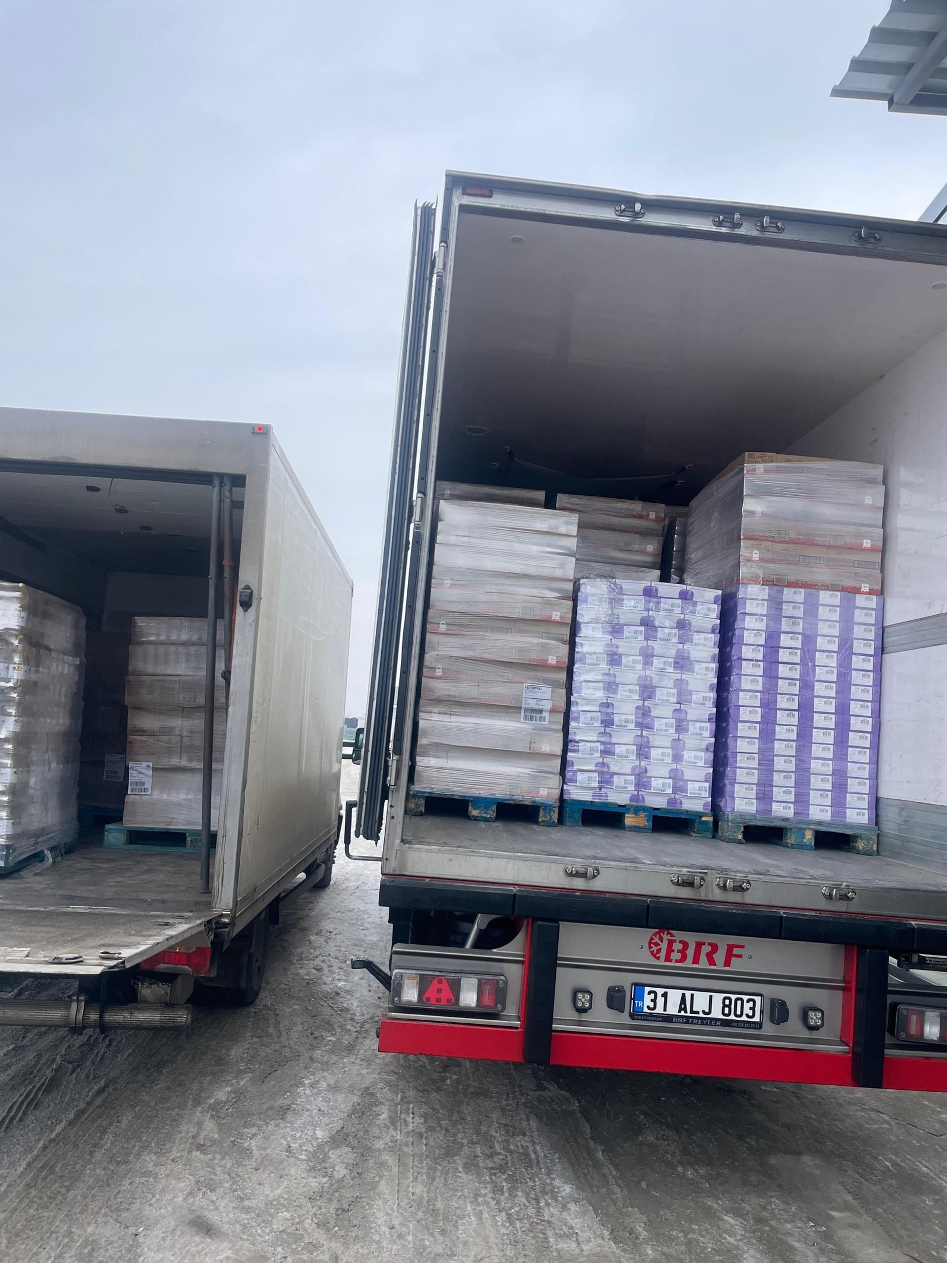 cargo ships docked at the pier during day