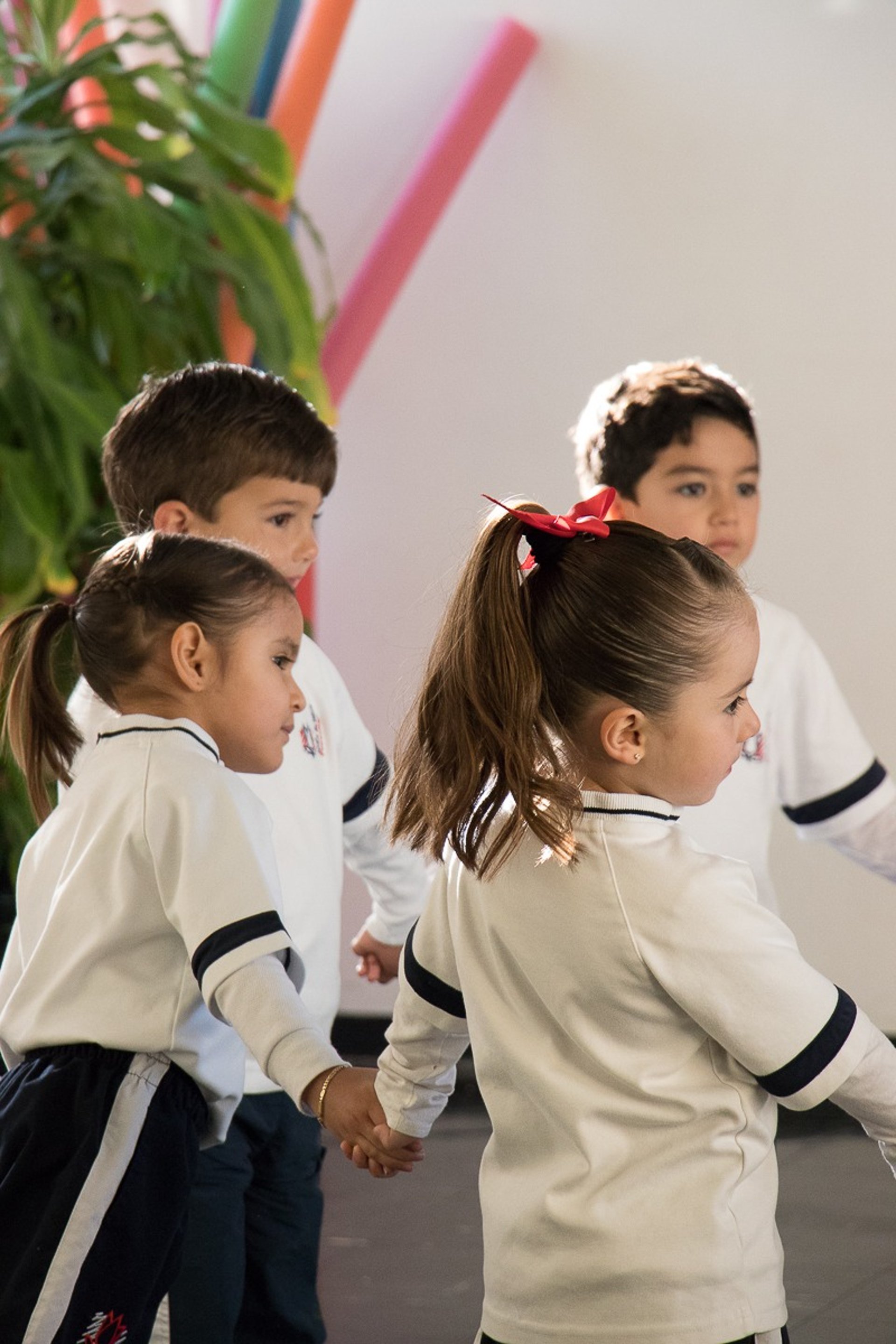 woman wearing yellow long-sleeved dress under white clouds and blue sky during daytime