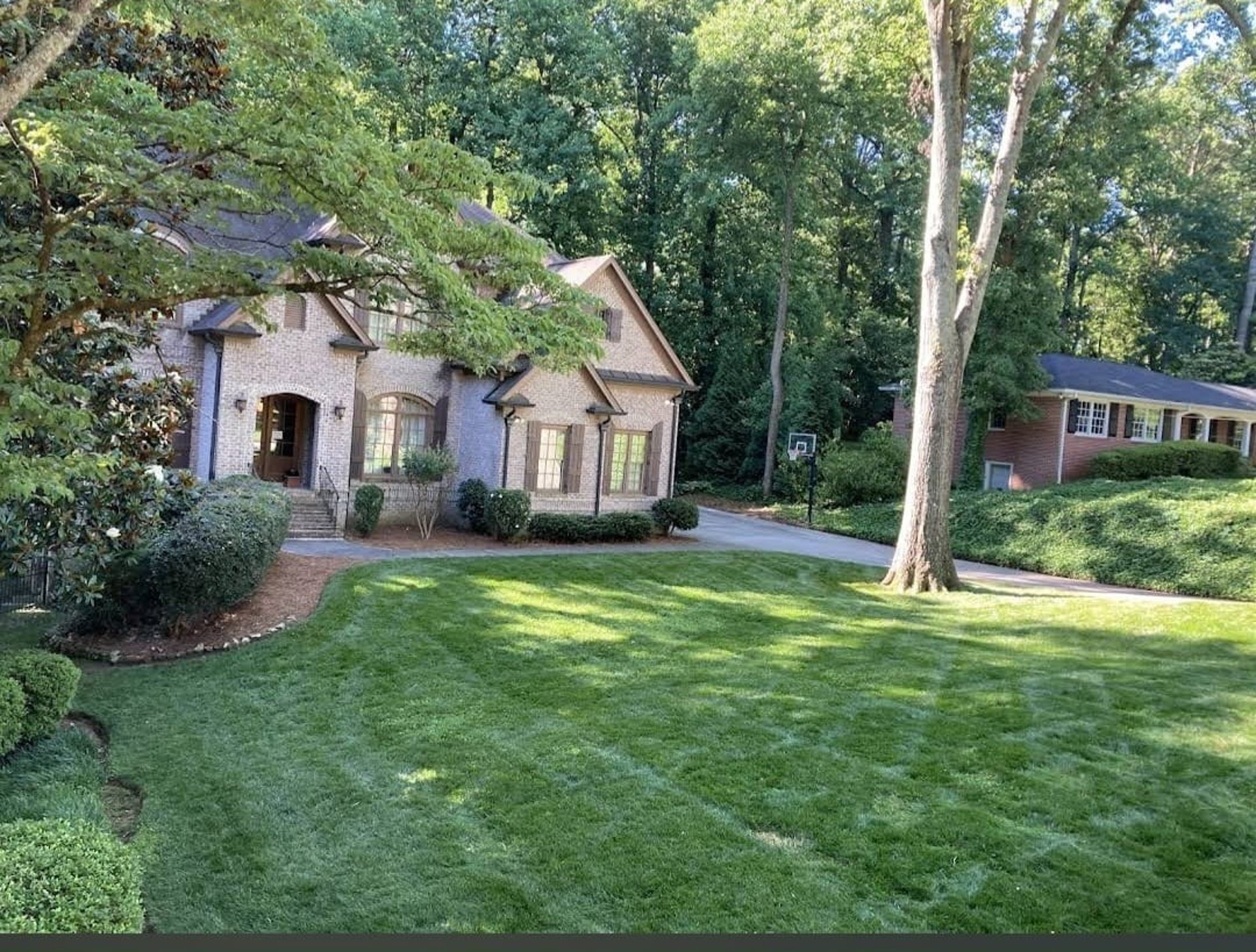 black and brown leather padded tub sofa