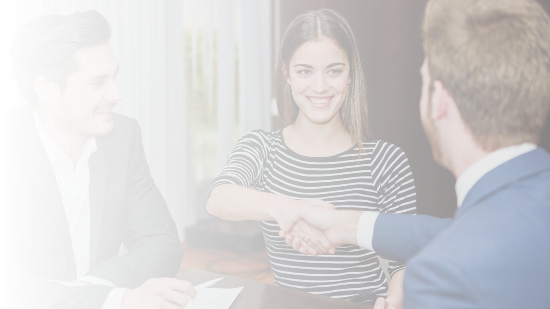 an abstract photo of a curved building with a blue sky in the background