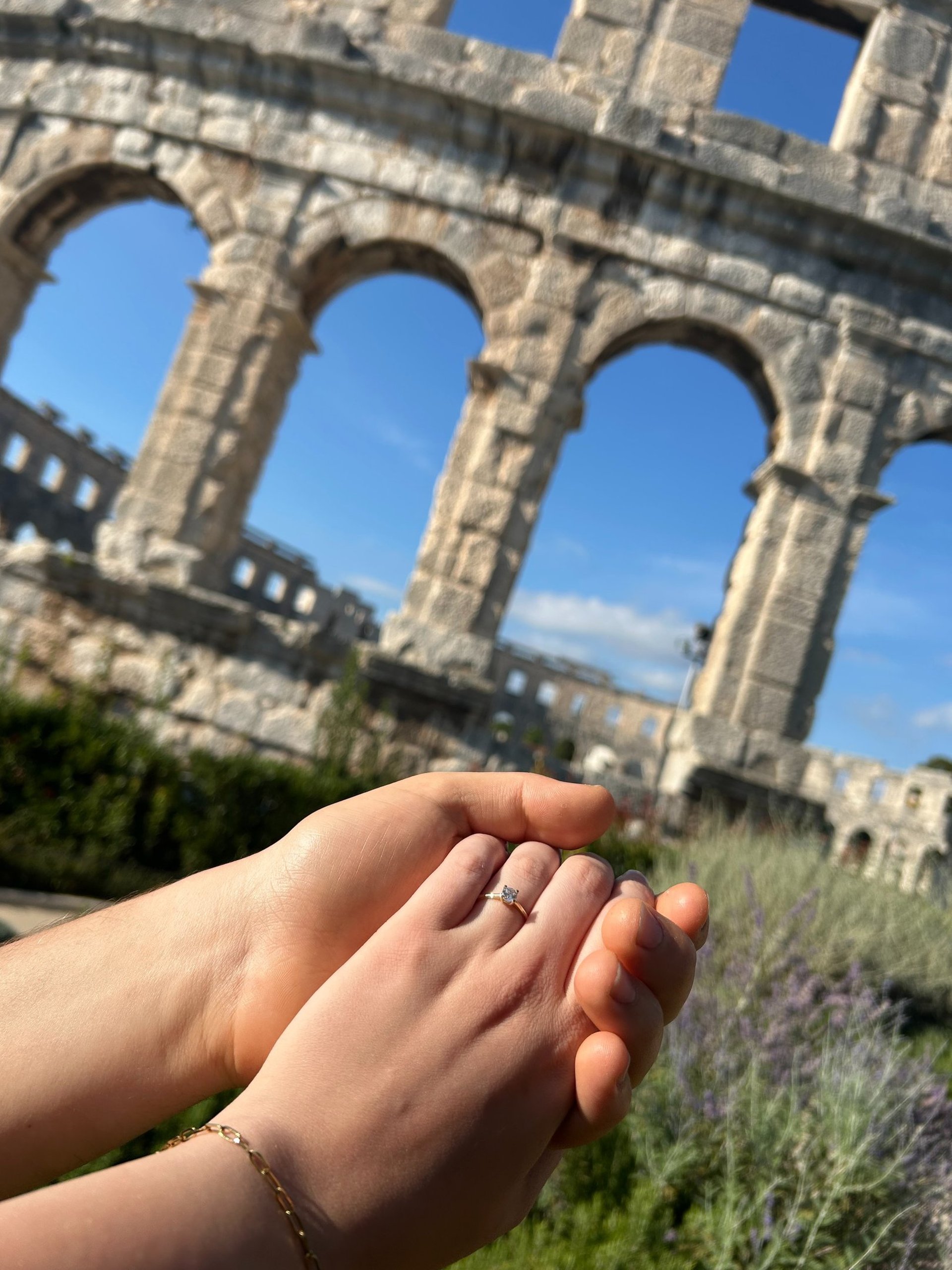 couple wearing silver-colored rings
