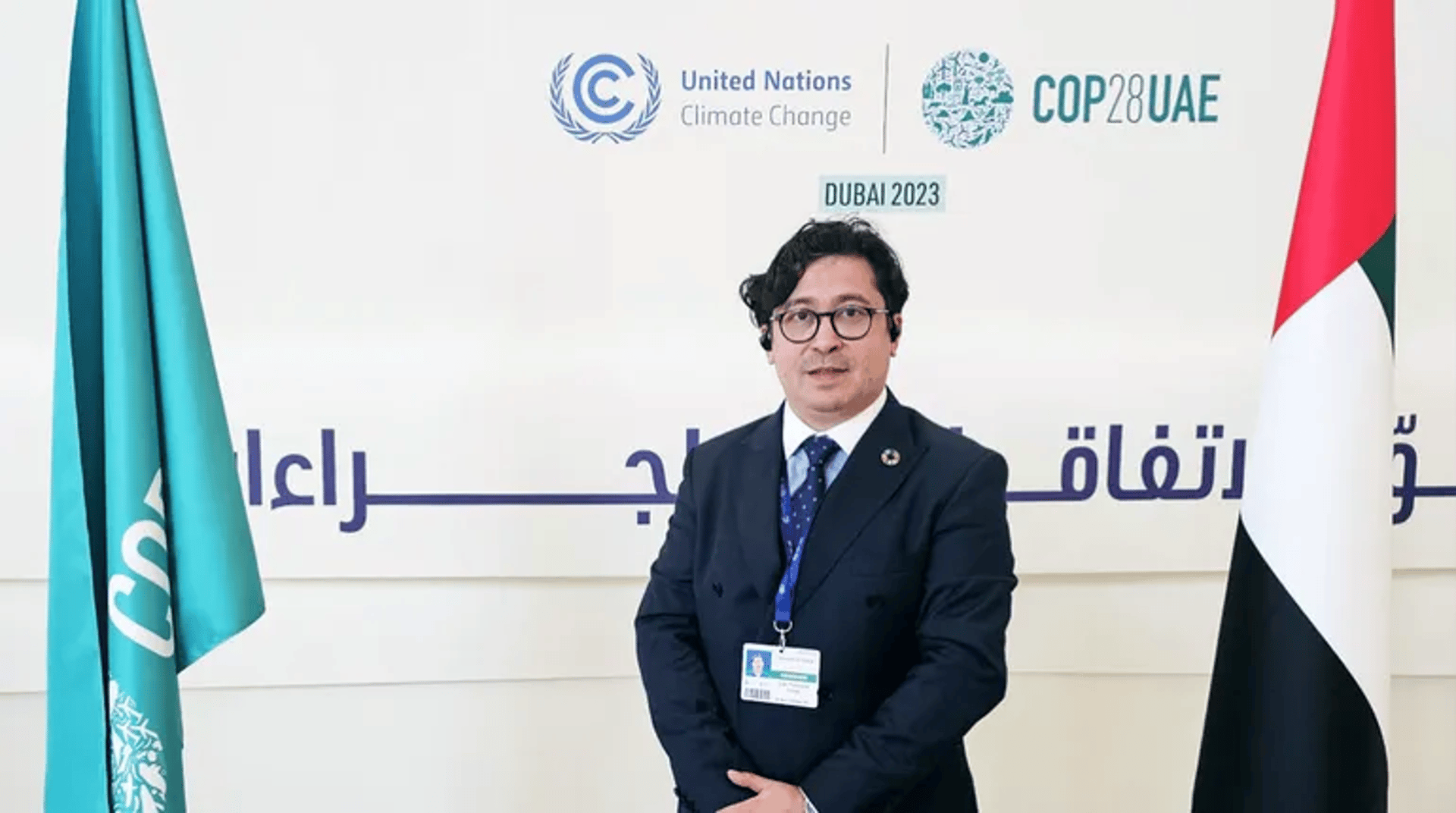 An electric car is charging at a charging station.