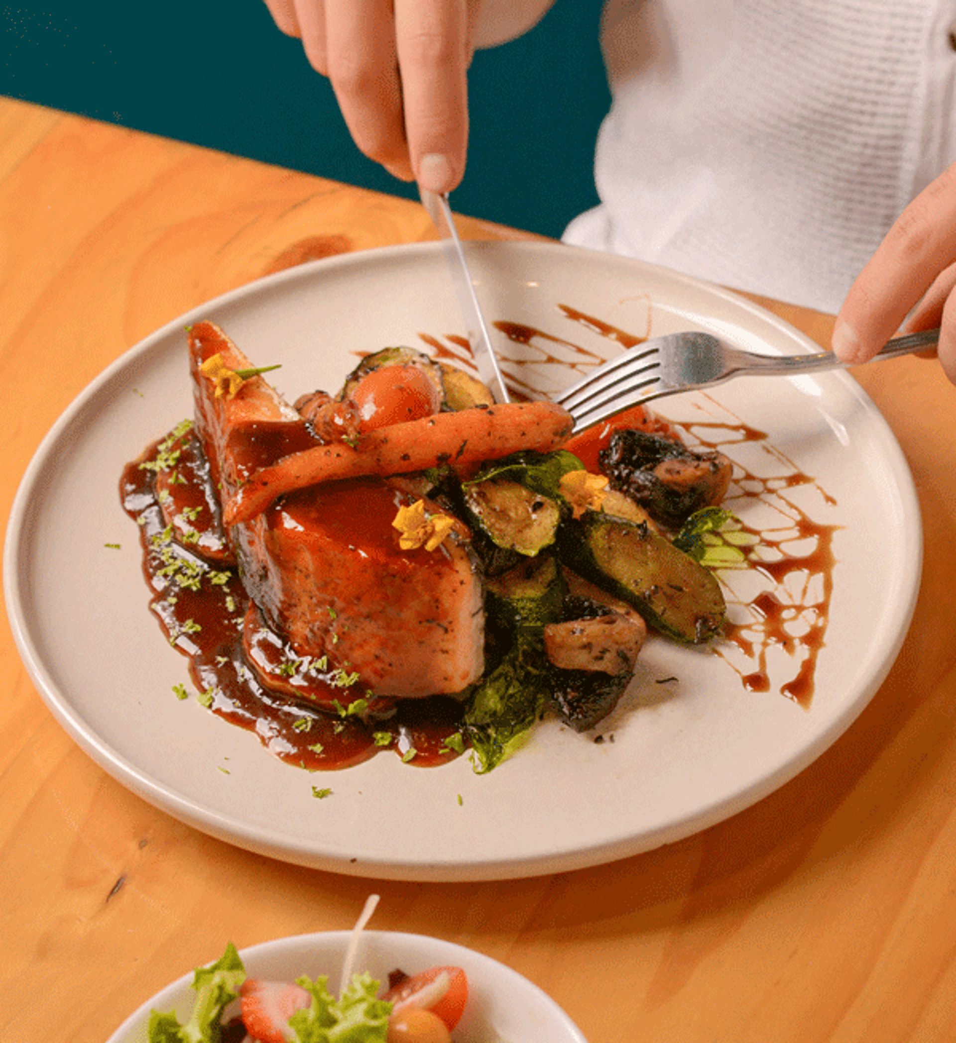 an abstract photo of a curved building with a blue sky in the background