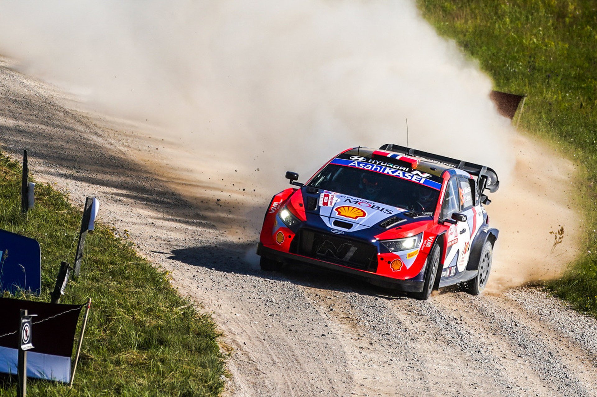 woman wearing yellow long-sleeved dress under white clouds and blue sky during daytime