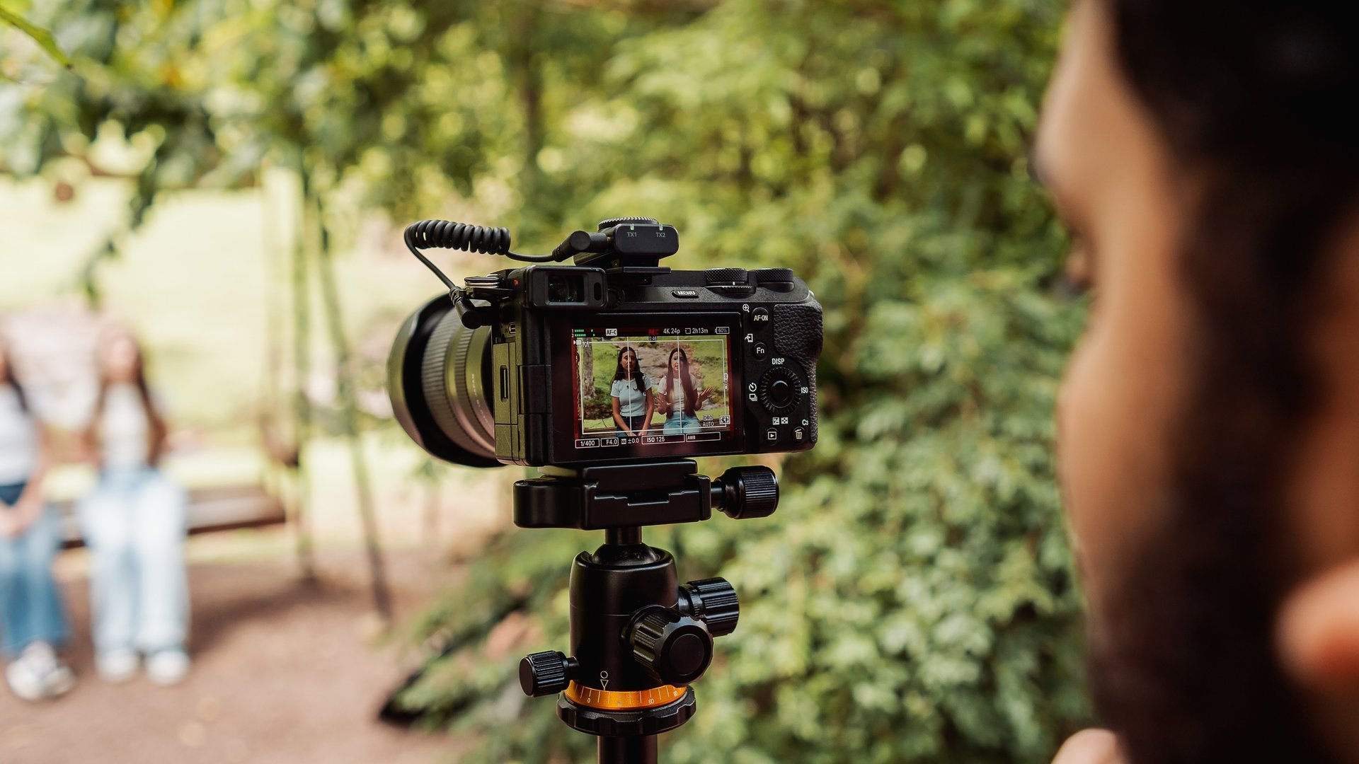 an abstract photo of a curved building with a blue sky in the background