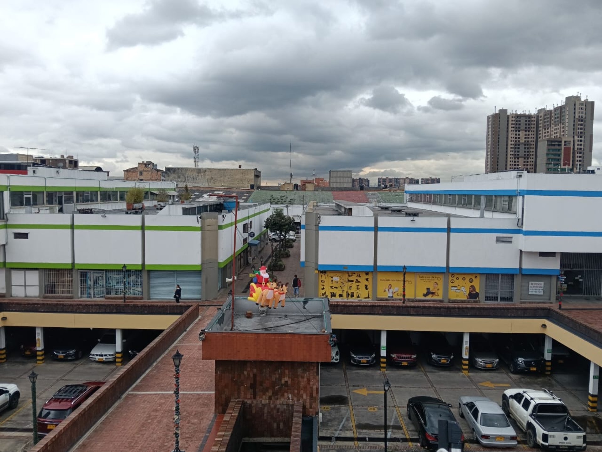woman wearing yellow long-sleeved dress under white clouds and blue sky during daytime
