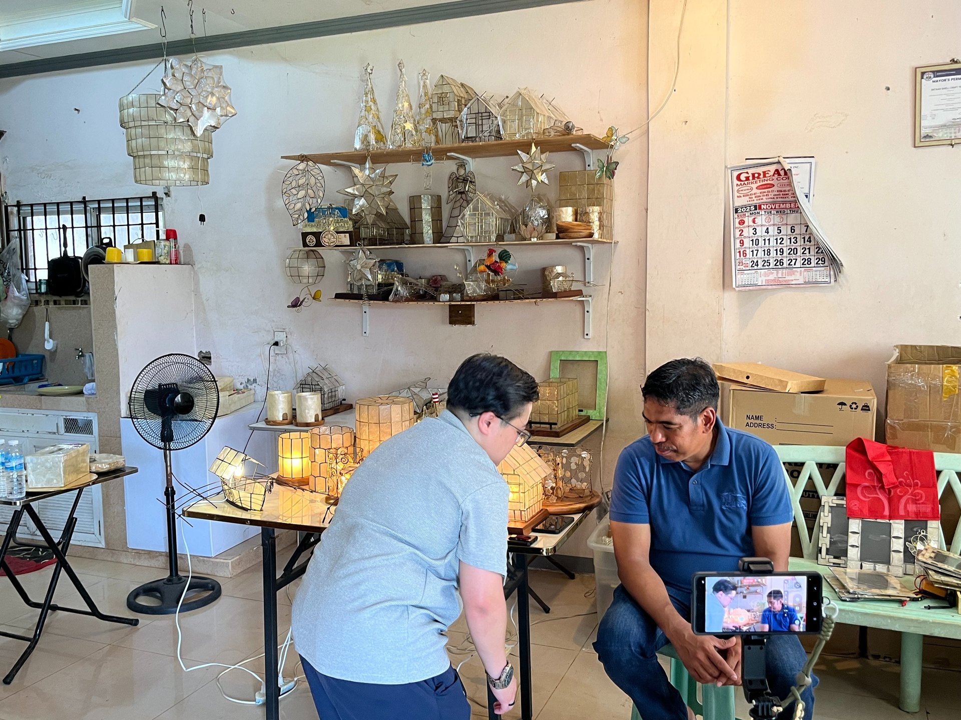 a close up of a black and brown abstract painting
