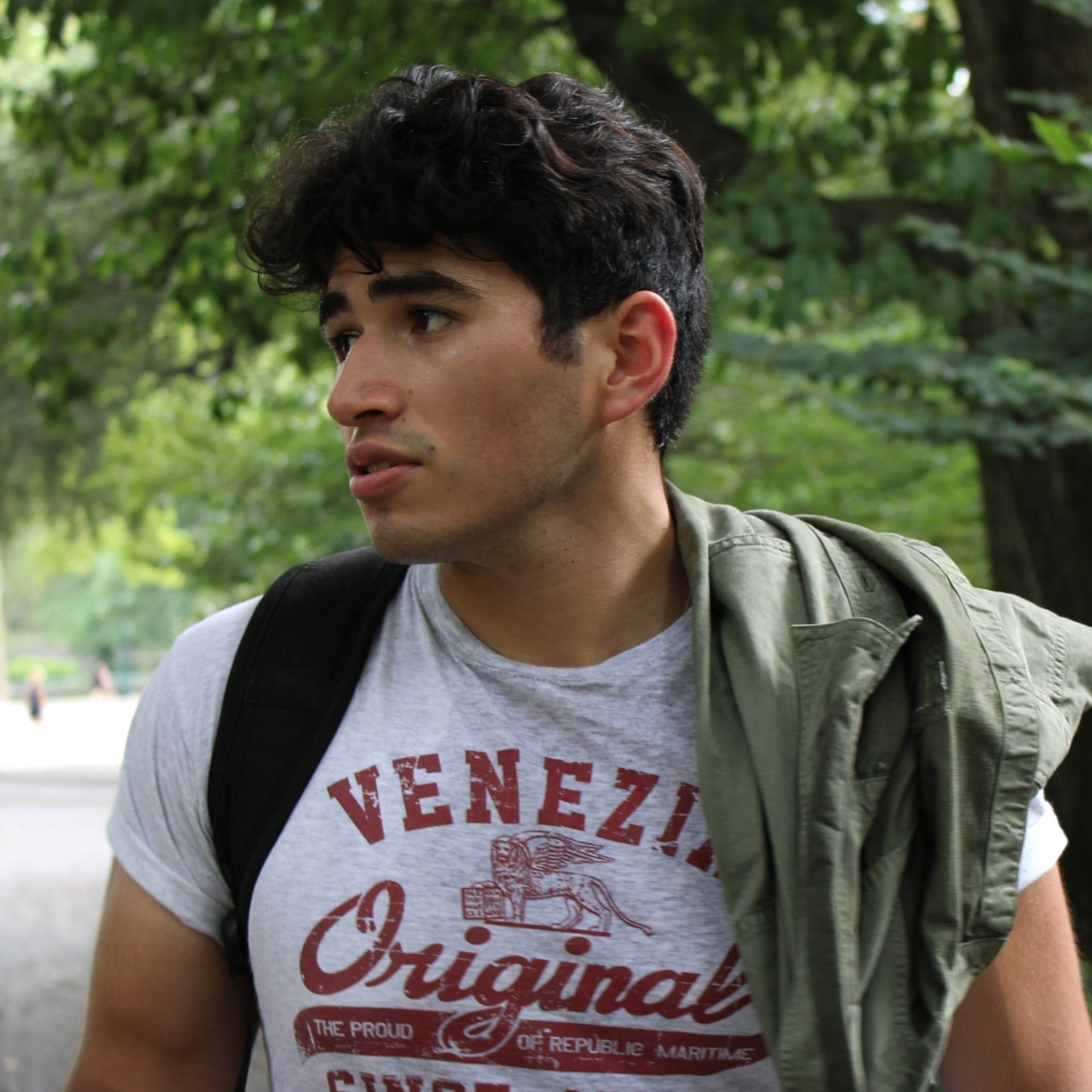 woman wearing yellow long-sleeved dress under white clouds and blue sky during daytime